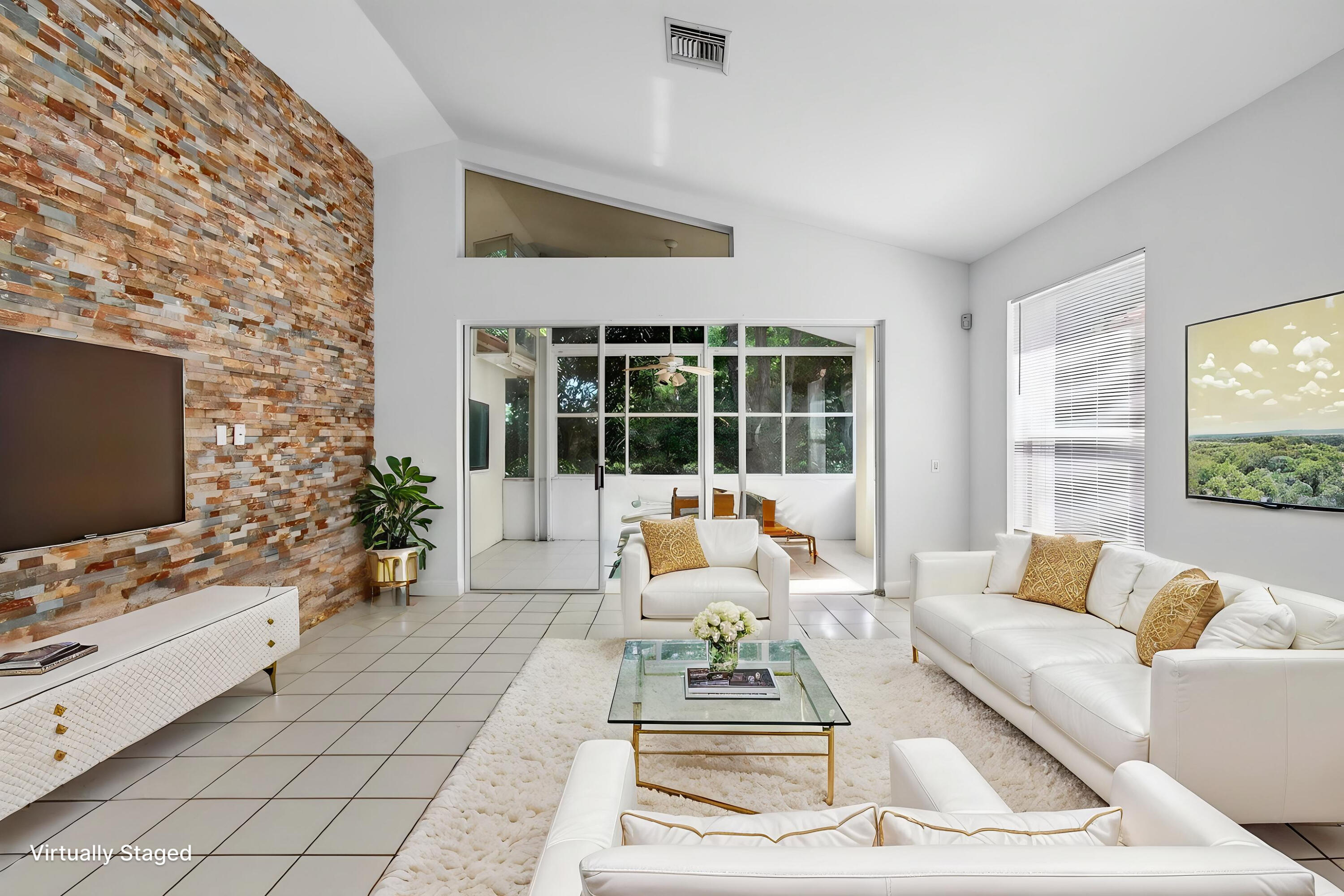 BROOKSIDE AT INDIAN SPRING IS A SUPER ACTIVE ADULT COMMUNITY, 55+.  Welcome to 5225 Brookview Drive, located in the vibrant heart of Boynton Beach, Florida. This single-family residence, a component of the coveted Brookside at Indian Spring community, proudly embodies an exquisite blend of practicality and grace. Detached from the hustle and bustle yet amid local amenities, this timelessly elegant property is distinguished by its architectural charisma.   Upon stepping into the dwelling, the sigh-worthy vaulted ceilings capture your immediate attention. The posh tile flooring embellishes the house's aesthetic appeal, while the cozy laminate flooring in both bedrooms creates a perfect blend of comfort and style.  In the kitchen, the culinary heartland of any home, you'll find more than enough cabinet space to cater to your storage needs, elegantly garnished with granite countertops. Complementing its sophisticated design are the stainless-steel appliances ideal for your daily needs. An eat-in area and separate pantry illustrate the mindful use of space. This well-equipped kitchen also includes an exterior entrance with a slider, enhancing its usability.  Within the master suite confines awaits an enclave of comfort and functionality - an expansive window, two walk-in closets, and an ensuite bathroom fully furnished with a step-in shower, a large linen closet, and a double vanity.  Increased functionality comes with the addition of a convenient laundry room, fully equipped with a full-size washer and dryer. Also, installed accordion shutters throughout the house assure safety with an aesthetic touch.  Venture outside, and you'll find a spacious backyard and side yard, perfect for relaxation or entertainment. The covered patio offers an ideal setting for various gatherings or simply enjoying Florida's welcoming weather.  Nestled within the Indian Spring Country Club's bounds, optional membership means you get lifestyle choices ranging from a peaceful retreat to actively engaging in social events. This ideally located house puts you just minutes from the pristine beach, lively Downtown Delray Beach, and a variety of shopping and dining options. You'll enjoy the freedom and perks of this place, with no worries about cable, internet, or landscaping, as they're included in the rent. The property is an annual unfurnished rental, offering the opportunity to decorate to personal taste under a very accommodating landlord.  The amenities in Brookside are second to none, offering a 24-hour manned security gate, community pool, and hot tub. It also provides optional golf/social memberships at Indian Spring Country Club, which possesses two championship 18-hole courses.  Indulge in the rich tapestry of serene living that's every bit as much about location as it is the home itself, at 5225 Brookview Drive.   This prime property won't last, so schedule your personal tour today!  REQUIREMENTS FOR AN ANNUAL RENTAL: NO SMOKING $3,500 PER MONTH, UNFURNISHED--FIRST, LAST, SECURITY, RENTER'S INSURANCE, PROOF OF INCOME, CREDIT CHECK, BACKGROUND CHECK, 700 CREDIT SCORE, + $250 CLEANING FEE. TENANT PAYS WATER AND ELECTRIC.