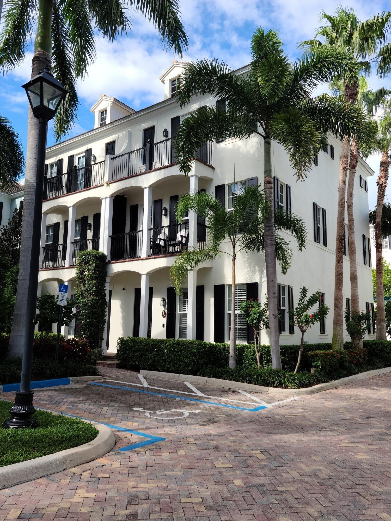 Luxury Coastal Living in Cannery Row, Delray Beach  Premier location within the secluded center of Cannery Row.  These center units do not come up for sale often.     Welcome to your dream home in the heart of Delray Beach's sought-after Cannery Row! This stunning 3-bedroom, 3.5-bathroom townhome is a perfect blend of elegance, comfort, and coastal charm. Nestled in the vibrant Pineapple Grove Arts District, you'll be just steps away from Atlantic Avenue's top restaurants, boutique shops, and lively entertainment all while enjoying the tranquility of this exclusive community. The property is located in the center of the Cannery Row development, away from direct street noise.   Inside, you'll find high-end finishes throughout, including gourmet kitchen with quartz counte rtops, stainless steel appliances, and custom cabinetry. The open-concept living and dining area boasts soaring ceilings, wood flooring, and abundant natural light. Each bedroom features en-suite bathrooms and spacious walk-in closets, while the primary suite has dual vanities and a large walk-in shower. Enjoy your morning coffee or evening wine on one of two private balconies overlooking the pool/courtyard and lush landscaping within the community. With a two-car garage and home-automation features, this residence provides both convenience and modern luxury. Just minutes from pristine beaches, top golf courses, and world-class cultural attractions, this is your opportunity to live in one of Delray Beach's most desirable locations.