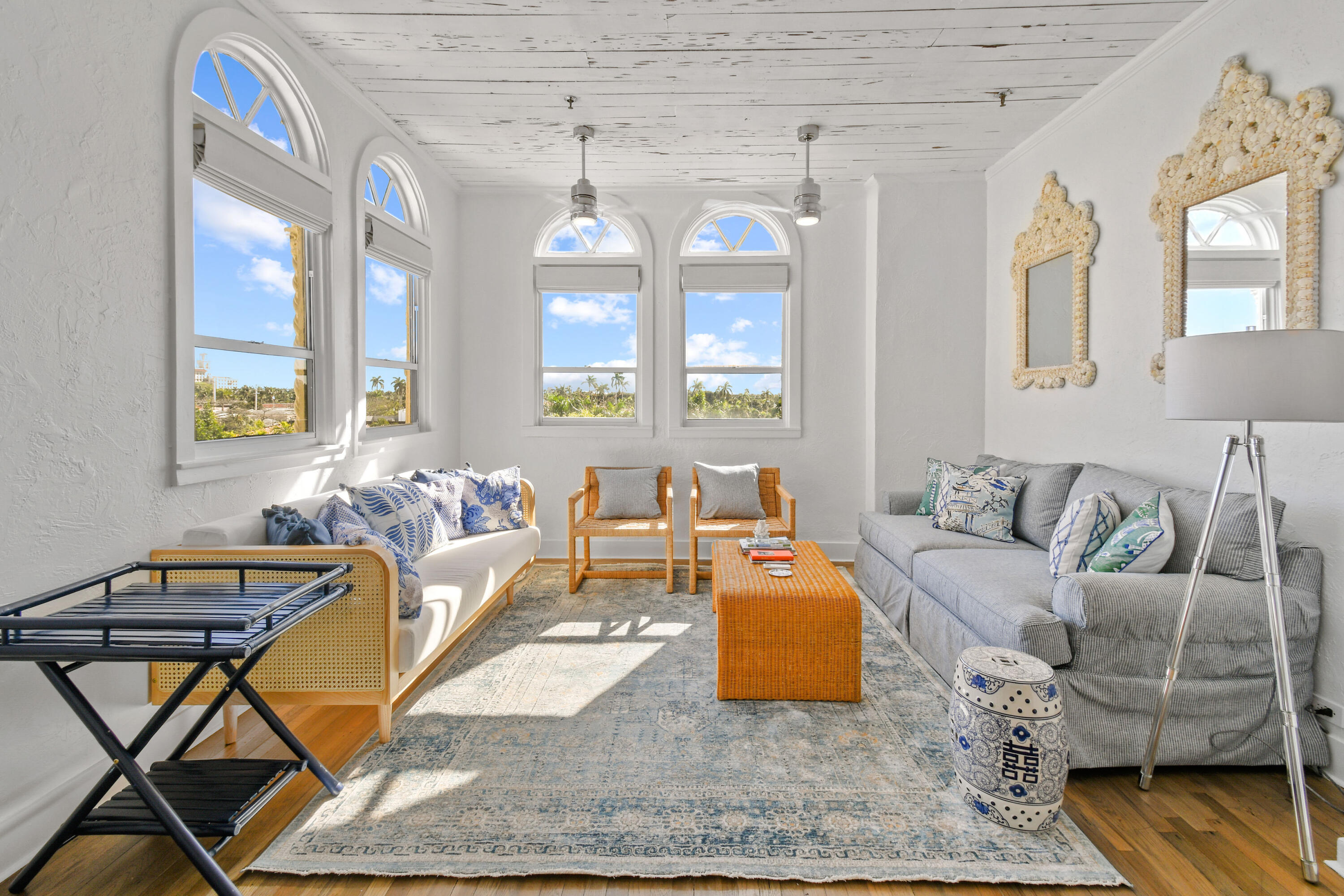 A rare, one-of-a-kind penthouse that captures the essence of classic Palm Beach charm. Soaring ceilings, rich pecky cypress wood, and original Dade County pine floors set the tone, while abundant natural light pours in through its prized southern exposure. Enjoy dynamic views of the downtown West Palm Beach skyline along with beautiful ocean views and glimpses of the ocean's breaking waves. The property offers unlimited and immediate short-term rental potential, allowing owners to rent on platforms such as Airbnb with no minimum rental restrictions. Whether enjoyed as a personal coastal retreat or utilized as a highly desirable income-producing property, this penthouse provides rare flexibility in one of South Florida's most sought-after locations.