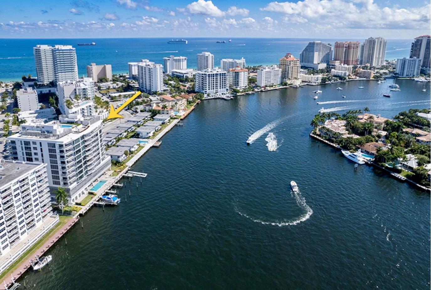 New boat lift (24,000 lbs) 40'x12' boat slip & pool side Cabana. Luxury boutique bldg 31 residences. Flow through unit, 3 bedrooms, ensuite baths, den/office, half bath, 2 terraces, & summer kitchen, flat screen tv, grill, refrigerator, sink, & ice machine on sunset terrace. Custom designed lighting throughout, electric shades, high impact glass, & continuous sound system throughout. Gaggenau GAS cooktop, oven, refrigerator, wine cooler & Bosch dishwasher, Scavolini Italian cabinets & quartz counter tops. Amenities: rooftop pool, with ocean views, sunset pool & private marina, flow through lobby designed by Steven G, state of the art gym & more. 2 garage spaces & 2 pets ok. Close to beach & restaurants.