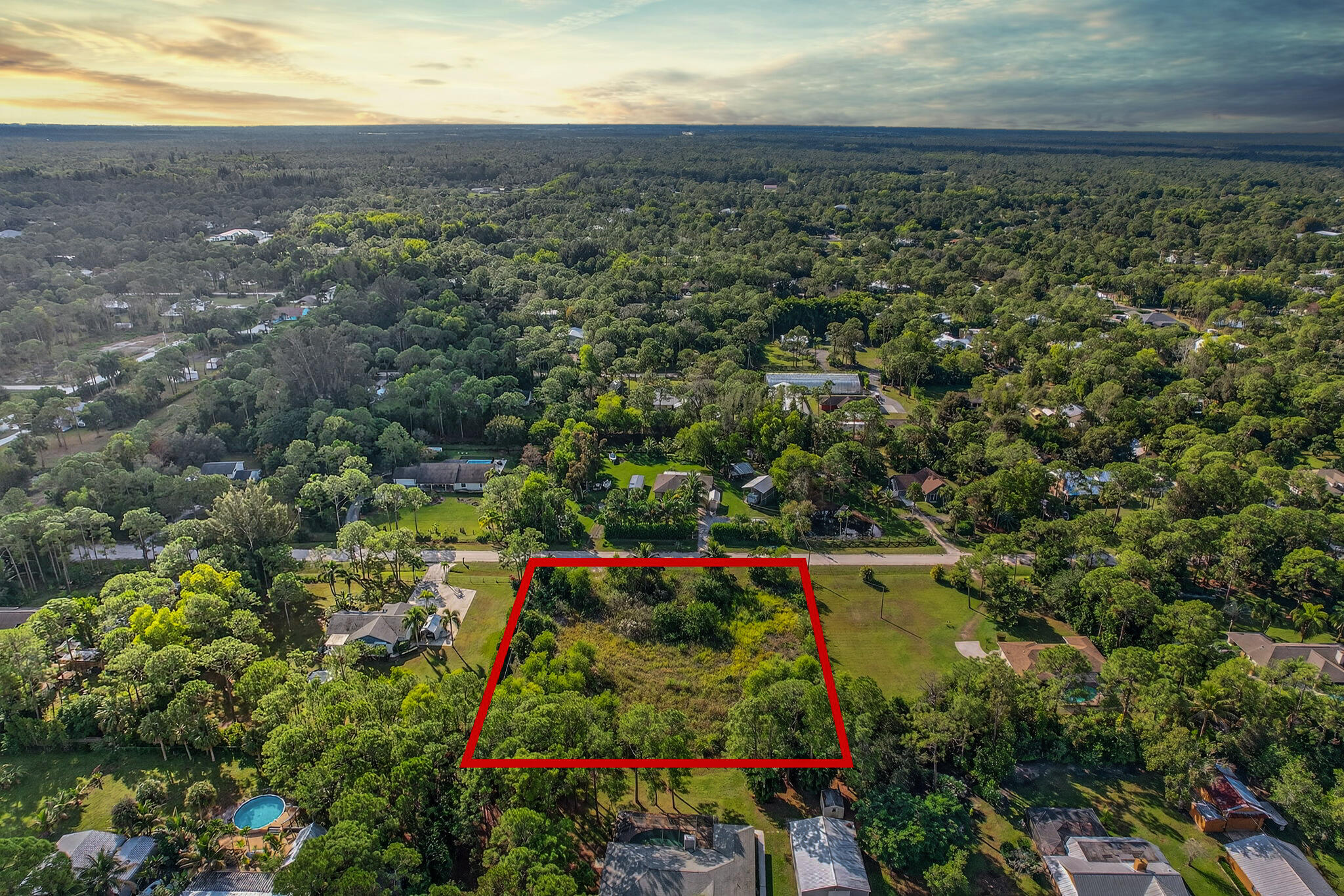 Build the life you've imagined in the heart of Jupiter Farms, where wide-open skies meet the natural beauty and peaceful lifestyle of South Florida. This exceptional cleared and build-ready homesite offers a rare opportunity to bring your dream home to life creating your perfect private retreat. This property delivers the best of both worlds — space, privacy, and tranquility while remaining just minutes from beautiful beaches, shopping, dining, and everything that makes the Jupiter Farms lifestyle so desirable. This isn't simply vacant land. It's a blank canvas for your future, your vision, and your own piece of paradise.