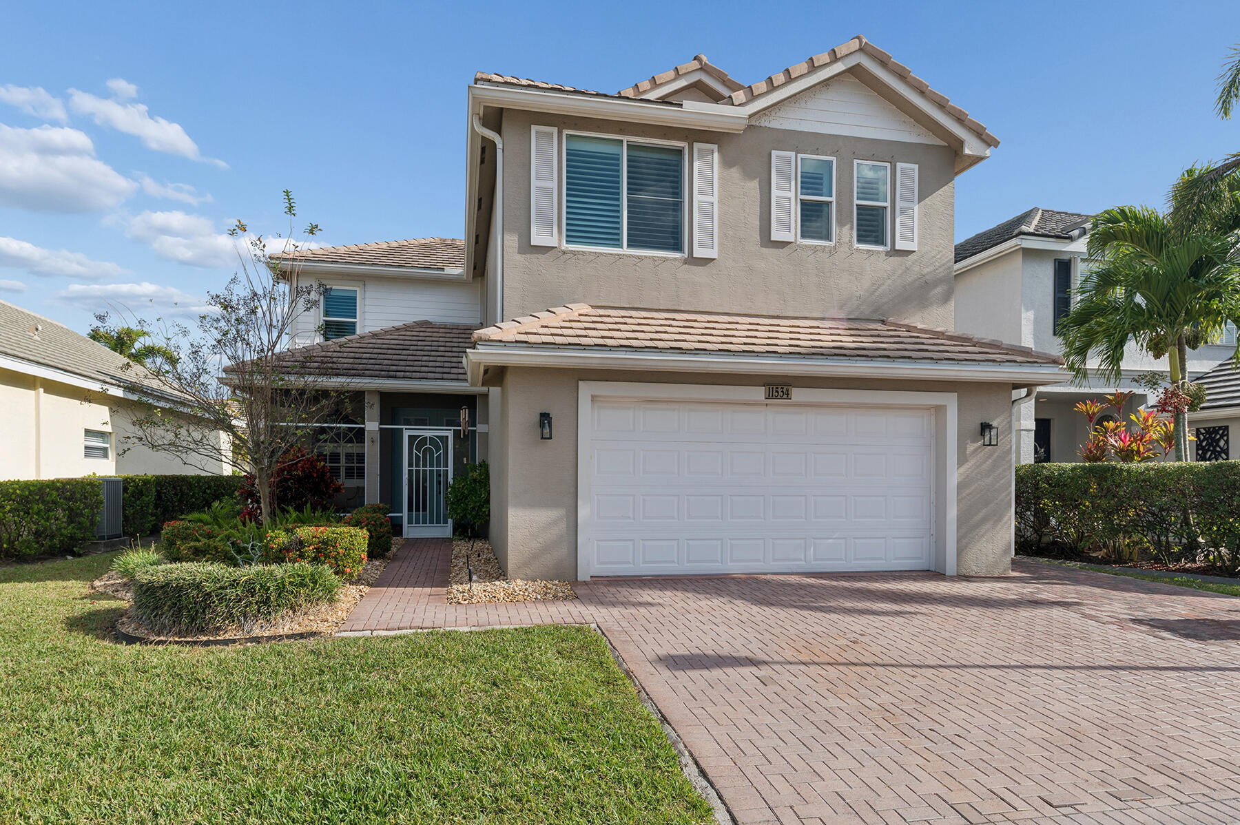 Welcome to this beautifully updated lakefront estate residence with 3,165sqft total located in the gated Victoria Parc Estates in the heart of desirable Traditions and walking distance to Traditions Square. This spacious home offers 3 bedrooms, 2 and a half bathrooms, a first floor den or playroom and an expansive upstairs flex space ideal for a second living area, 4th Bedroom, home office, gym, or media room. Enjoy a serene long lake view from your private backyard oasis, complete with a saltwater pool, tropical landscaping, and plenty of space for outdoor entertaining or quiet relaxation. Inside, the home features a bright, open floor plan with modern finishes, the extended kitchen has white cabinets, white quartz countertops, SS appliances and wood-like tile through out the living area Victoria Parc residents enjoy access to walkable parks and trails, nearby shopping and dining, and a vibrant calendar of community events. Experience the unmatched lifestyle that Tradition living offers.