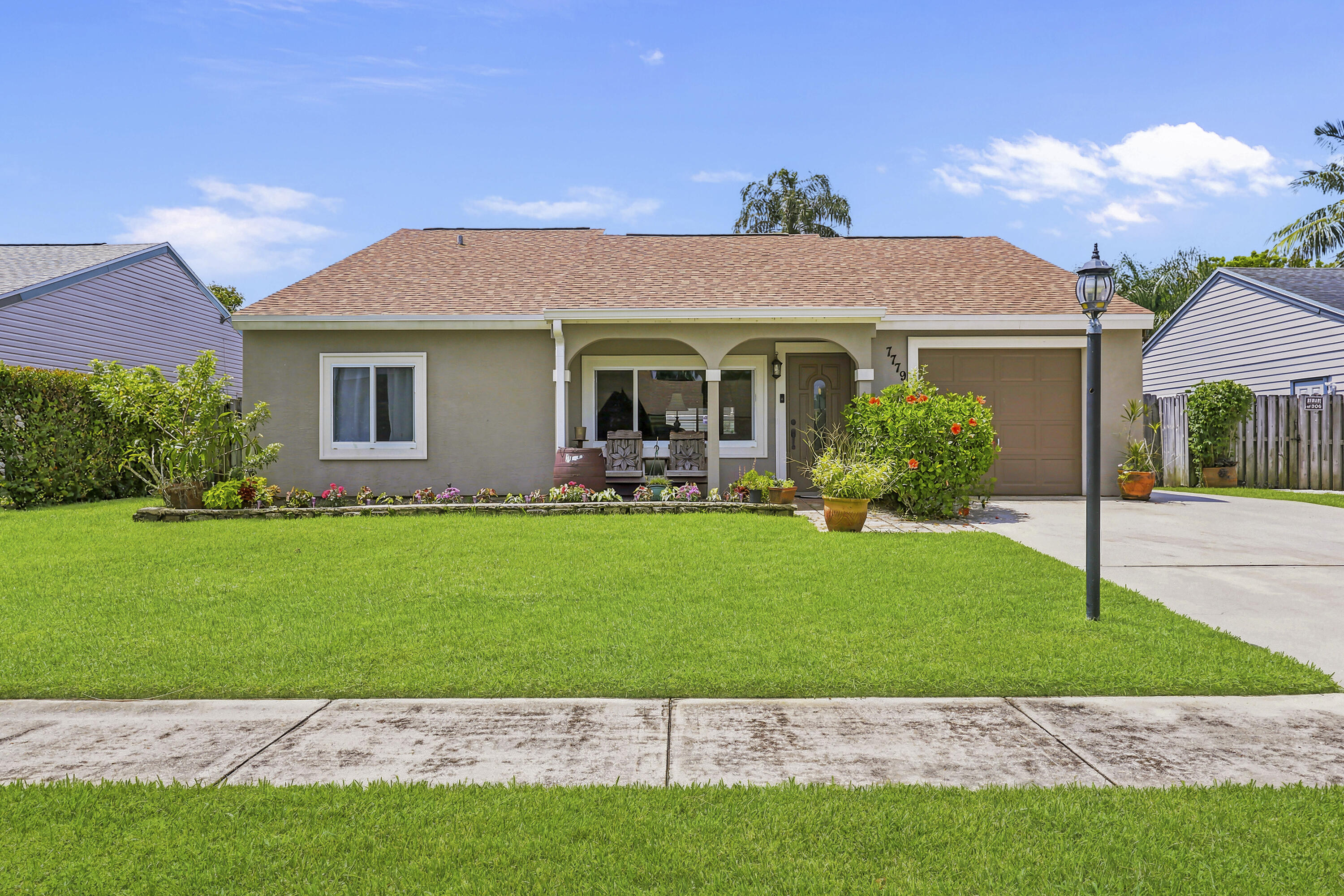 Welcome to 7779 Blairwood Circle N, Lake Worth, a beautifully maintained and move-in ready home offering the perfect blend of comfort, style, and value. This spacious residence has been thoughtfully updated and features a brand new roof in 2025, complete impact windows, and a 2019 A/C, providing peace of mind for years to come. One of the home's standout features is the recently completed Florida room addition, creating additional air-conditioned living space that's perfect for relaxing, entertaining, a home office, or enjoying the Florida lifestyle year-round. The bright and open floor plan is filled with natural light and offers a seamless flow between the living, dining, and kitchen areas. Step outside to enjoy the private backyard with plenty of room for outdoor gatherings,​​‌​​​​‌​‌​​​‌‌​​​‌‌‌​​‌​​‌‌​​​​ gardening,
