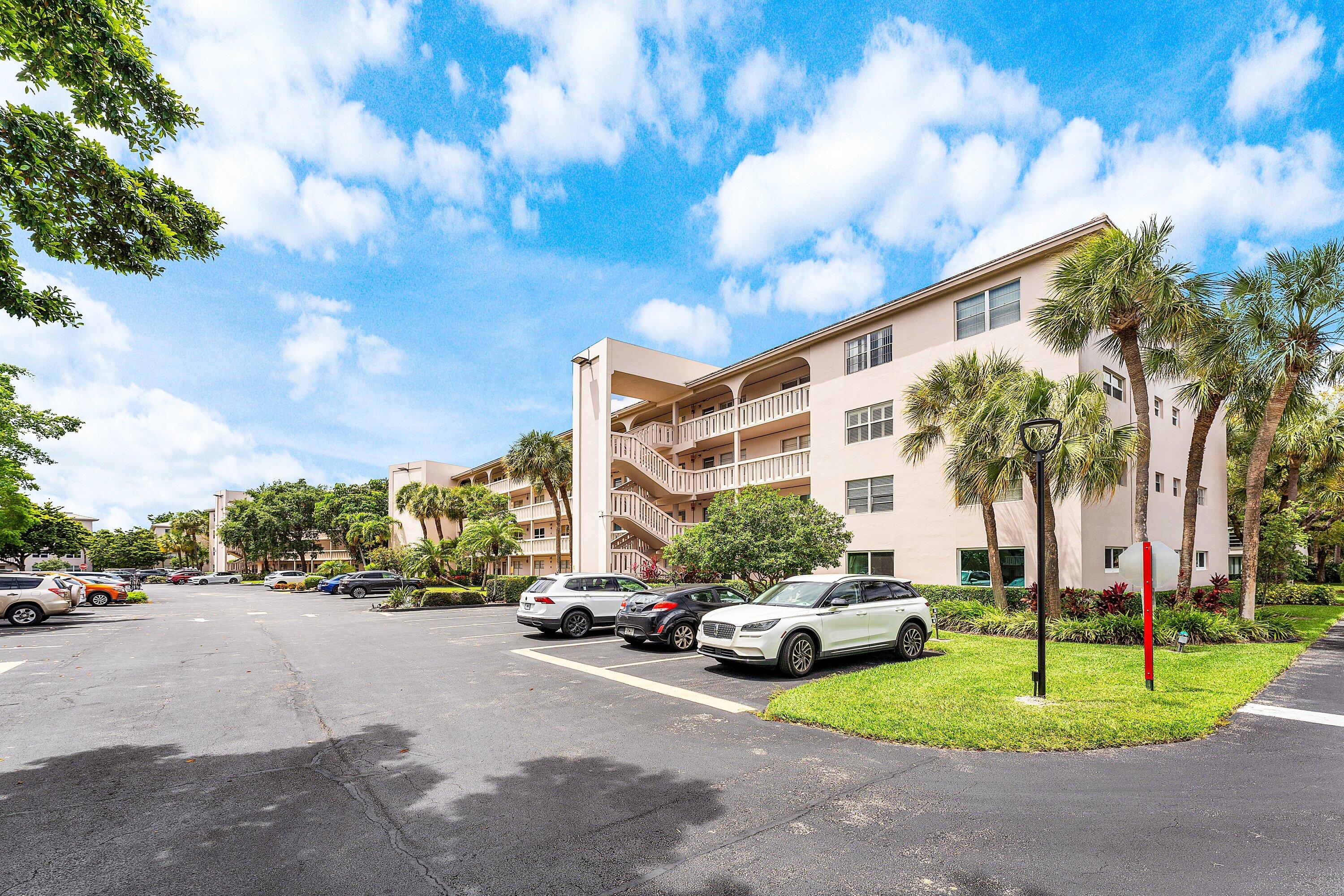 1st floor corner units don't come around often! This renovated home is ready for you to bring your furniture and enjoy everything this community offers! One of the premier condo communities in Coconut you will love living here. Enjoy the convenience of a full-size washer and dryer right in your unit. Located in Wynmoor, a highly sought-after 55+ community, residents are treated to a true resort-style lifestyle with a beautifully appointed clubhouse, on-site dining, theater, fitness center, golf, tennis, pickleball, and more. All of this just minutes from shopping, dining, and major highways, including the Turnpike, making everyday living and commuting effortless.