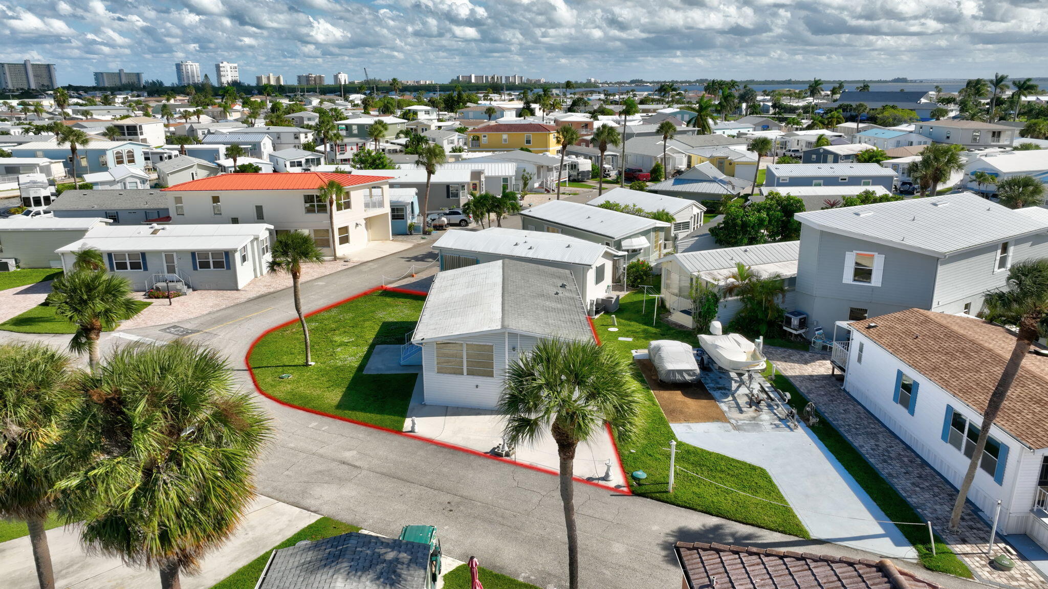 HUGE value on this unique OVERSIZED corner lot on Nettles Island, offering beautiful water views from multiple sitting areas and a setting rarely available. Positioned on nearly double the typical lot size, this property provides exceptional space, privacy, and flexibility in one of the island's most desirable locations. The home is solid, well-built, and move-in ready with great bones, presenting an excellent opportunity to update, expand, or create your ideal coastal retreat over time. The corner location allows for expanded parking, outdoor living, and an open feel that sets it apart from surrounding properties. Ideally located near the beach, marina, and resort-style amenities including pool, clubhouse, and private ocean access. Schedule a private showing today! Tons of activities too.