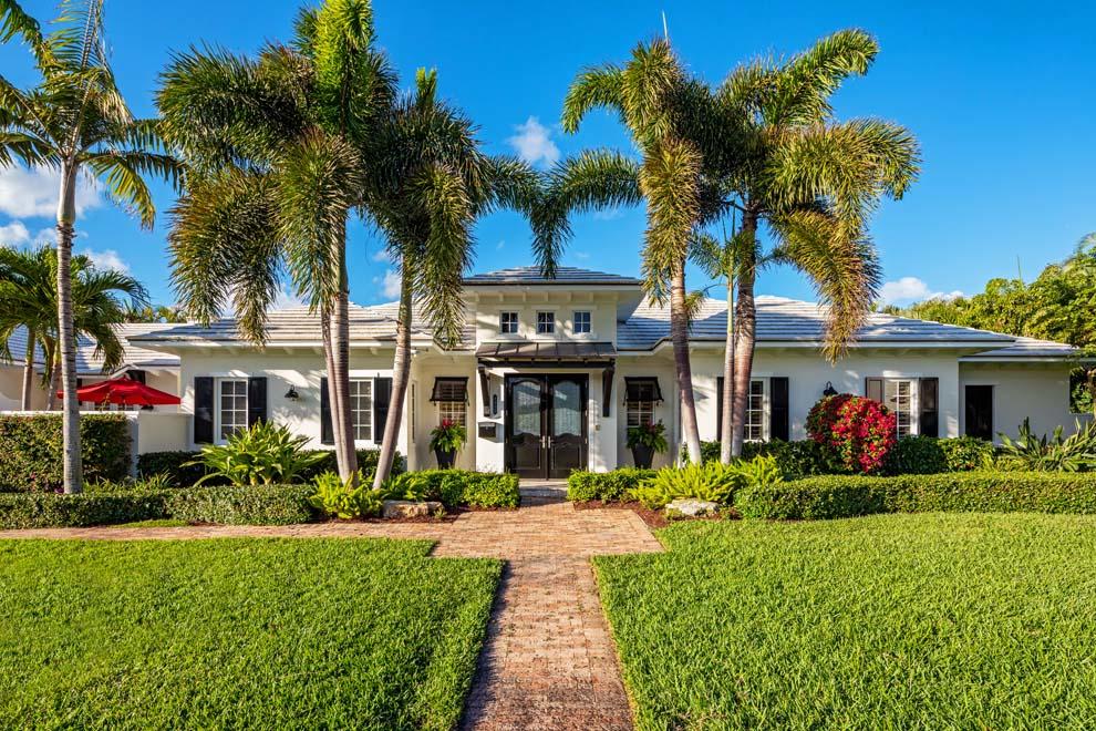 The stunning coastal property located at 1215 Crestwood Drive, Delray Beach is less than one block from the ocean complete with private beach access. Situated on an expansive parcel with 154 feet of frontage and 103 feet of depth, the property is just north of Atlantic Avenue's shops and eateries. Completely rebuilt in 2011 and in like-new condition with designer finishes, the residence boasts over 4,400 total square feet and offers open floor plan with stunning views of the pool and grounds, spacious chef's kitchen open to the family room, four bedrooms including new VIP suite addition, and several spots for outdoor entertaining including pool with spa, covered loggia and front courtyard with outdoor fireplace. The location is second-to-none for enjoying South Florida's luxury lifestyle. Meticulously maintained and in pristine condition, this beach area property offers a superb location just steps from the private beach access, a few blocks from East Atlantic Avenue and a pleasant drive along A1A to Palm Beach's Worth Avenue, Boca Raton's Mizner Park and Fort Lauderdale's Las Olas Boulevard. Traveling is easy with several private jetports and three international airports nearby via Federal Highway or Interstate 95. 

Completely rebuilt in 2011 to the highest of standards with custom finishes and designer touches throughout, the residence offers a casual elegance that sets the tone for any occasion from festive entertaining to private retreats. Situated on an expansive parcel with 154 feet of frontage and 103 feet of depth, the property is graced with exceptional curb appeal thanks to the manicured landscape and architectural style of the home. The brick paver walkway leads to the front porch and double glass door entry. The open floor plan is enhanced by the wood cypress paneled ceilings throughout and picturesque views of the grounds and pool with spa. The living room has built-ins and is open to the dining area with two full walls of sliders and French doors that open to the patio and covered loggia for inviting the outdoors in. The spacious chef's kitchen has marble countertops, lots of custom cabinets, large island, top-of-the-line Monogram appliances, wine cooler, wet bar and plenty of room for breakfast area and snack bar seating on the family room side of the countertop. The family room has sliders to the pool and another private brick terrace on the west side of the property.

The private master wing is on the east side of the house with French doors to the covered loggia, large walk-in closet and master bath with dual sinks, jetted tub and walk-in glass shower. The VIP suite is on the west side of the house thanks to a recent addition and features a private access to a walking path,  walk-in closet and full bath with dual sinks, Jacuzzi tub and glass walk-in shower. There are two additional guest bedrooms with French doors to the front courtyard with outdoor fireplace.

The property was designed to maximize outdoor living and entertaining. The interior offers access to brick walking paths around the property and many windows and sliders provide lovely views of the grounds, pool with spa and outdoor fireplace with patio. The pool with spa invites endless hours of sun and fun with plenty of room for lounging and a covered loggia outdoor living area. Pack a picnic and head to the beach with ease thanks to the private beach access less than a block away. The front courtyard has an outdoor fireplace with ample space for enjoying South Florida's pleasant evenings. Additional features include marble and wood floors, impact windows and doors, laundry room, two-car garage, security system with cameras and large private fenced parcel with lots of green spaces.

This stunning beach area home is the perfect spot to enjoy South Florida's luxury lifestyle.