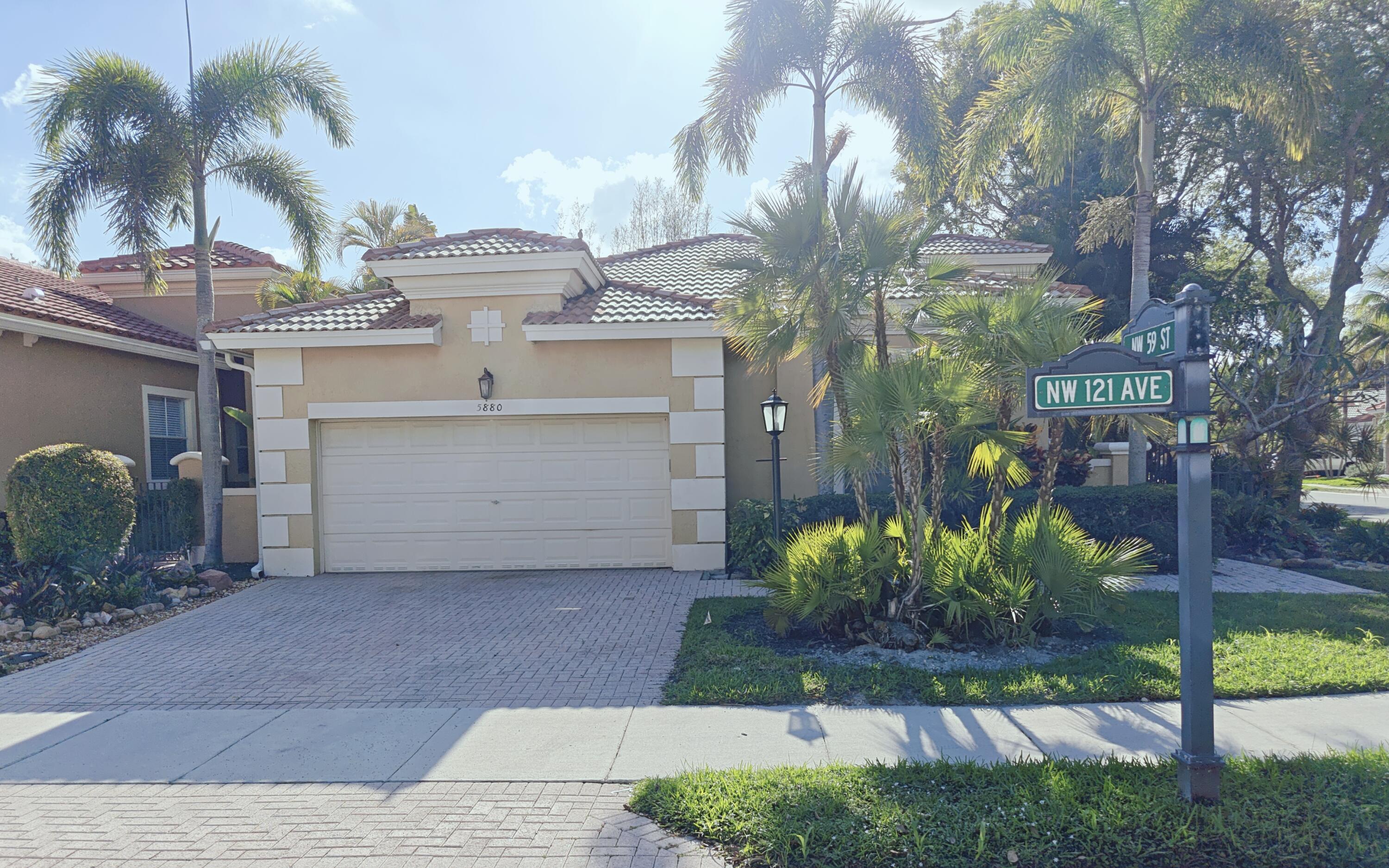 Welcome to your private one-of-a-kind tropical oasis! Home boasts custom-built multicolored LED lit waterfall pool with five seating areas for two! Concrete roof covered tiki hut with bar is perfect for entertaining! Own what will be the talk of the neighborhood in the desirable Heron Bay of Coral Springs. Two car garage! High vaulted ceilings throughout. Separate laundry room. Enjoy the backyard view from nearly every room in the house! Waterfall Pools, the homeowner's company has built custom exotic pools for 45 years! One-of-a-kind property likely won't last long. Family friendly gated community hosts multiple pools, clubhouses, playgrounds, tennis/pickleball courts and more! $445/mo. HOA! Agent accompanied showings