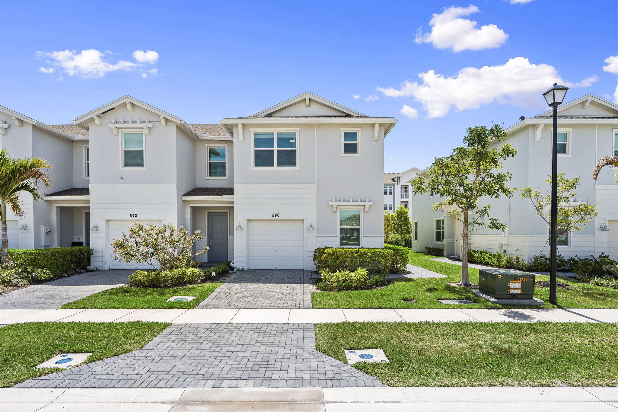 Built in 2023, this well maintained 3 bedroom, 2.5 bathroom corner unit in Veranda Landing offers light and bright living with impact glass, a modern open layout, and added privacy from the corner unit location. Residents enjoy access to the community pool while being within walking distance to The Shoppes at Veranda Falls with shopping, dining, grocery stores, and a gym just moments away. Conveniently located with quick access to both I-95 and the Florida Turnpike, this move-in ready home offers the perfect combination of comfort, convenience, and low maintenance living in one of Port St. Lucie's fastest growing areas.