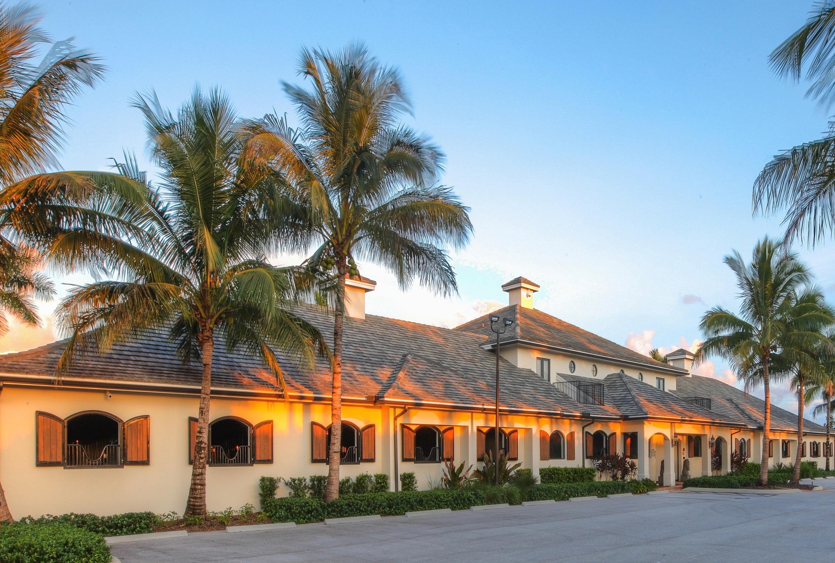 This spectacular 20-stall barn on 5.62 acres in the sought after Grand Prix Village has it all! Complete with top of the line equipment such as an Equi Spa, water treadmill, 4 wash racks, 2 tack rooms, Diptera fly system, air-conditioned feed room, laundry room, Crestron audio system throughout the property, security cameras, alarm system and enough jumps to build your own Grand Prix course!

For the owner there is a luxurious 2 bedroom/2 bath apartment on the second floor with huge gourmet kitchen and breakfast bar, living room, dining area, laundry room, wide plank wood floors, and large private balcony overlooking the Grand Prix field with both dining and living area including a pool table.

Downstairs there is a lounge area with a dining area that seats 10, Sony flat screen TV, and kitchenette with Sub-Zero fridge, microwave and dishwasher.  Perfect for lunch breaks or after hours events. The outdoor patio on the lower level features a Brazilian BBQ, dining area with seating for 12 and living area all furnished to the highest quality. To complete the amenities is a beautifully furnished office that comes complete with Mac desktop computer and printer.
This remarkable property is a must see for the discerning equestrian family.