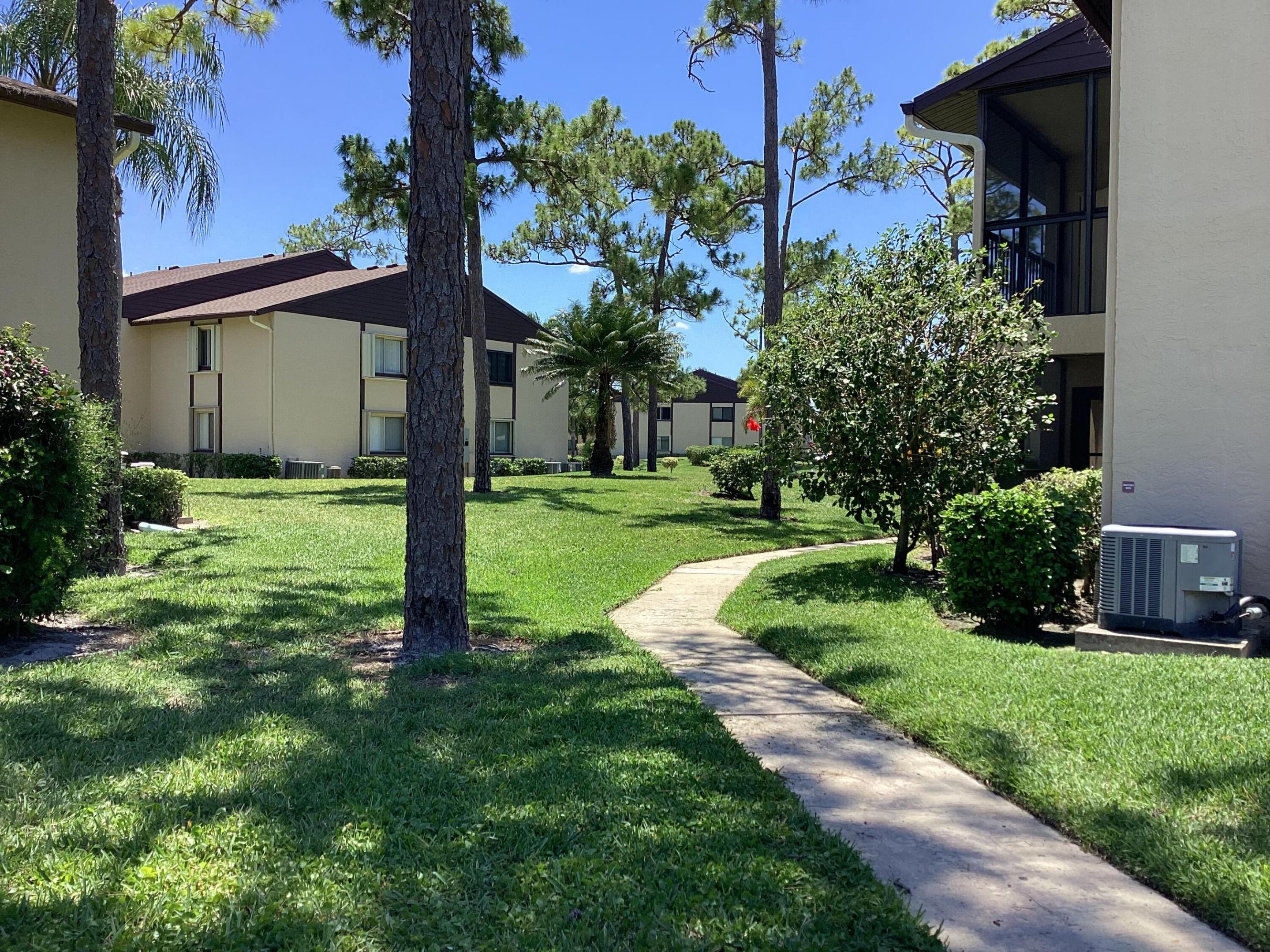Updated, super clean bright 1/1 with screened in patio with a beautiful garden view.  Located in  Pine Ridge South IV a quiet and well maintained community.  Spacious Main Bedroom that can easily accommodate  a King Size Bed . It has a sitting  area and a large walk in closet. Kitchen is open and over looks the dining room, living room and patio. In unit laundry room. Kitchen has all new appliances. Bathroom is fully renovated with a shower tub combination. New lighting fixtures, tile and vinyl plank through out.  Freshly painted,  PGT Impact windows. 2024 new roof. Clubhouse  and pool with lake view and walking trail. Shuffleboard, Bocce ball court and car wash. Onsite management office. Association fees $414 includes cable, Wi-Fi and outdoors maintenance et cetera.