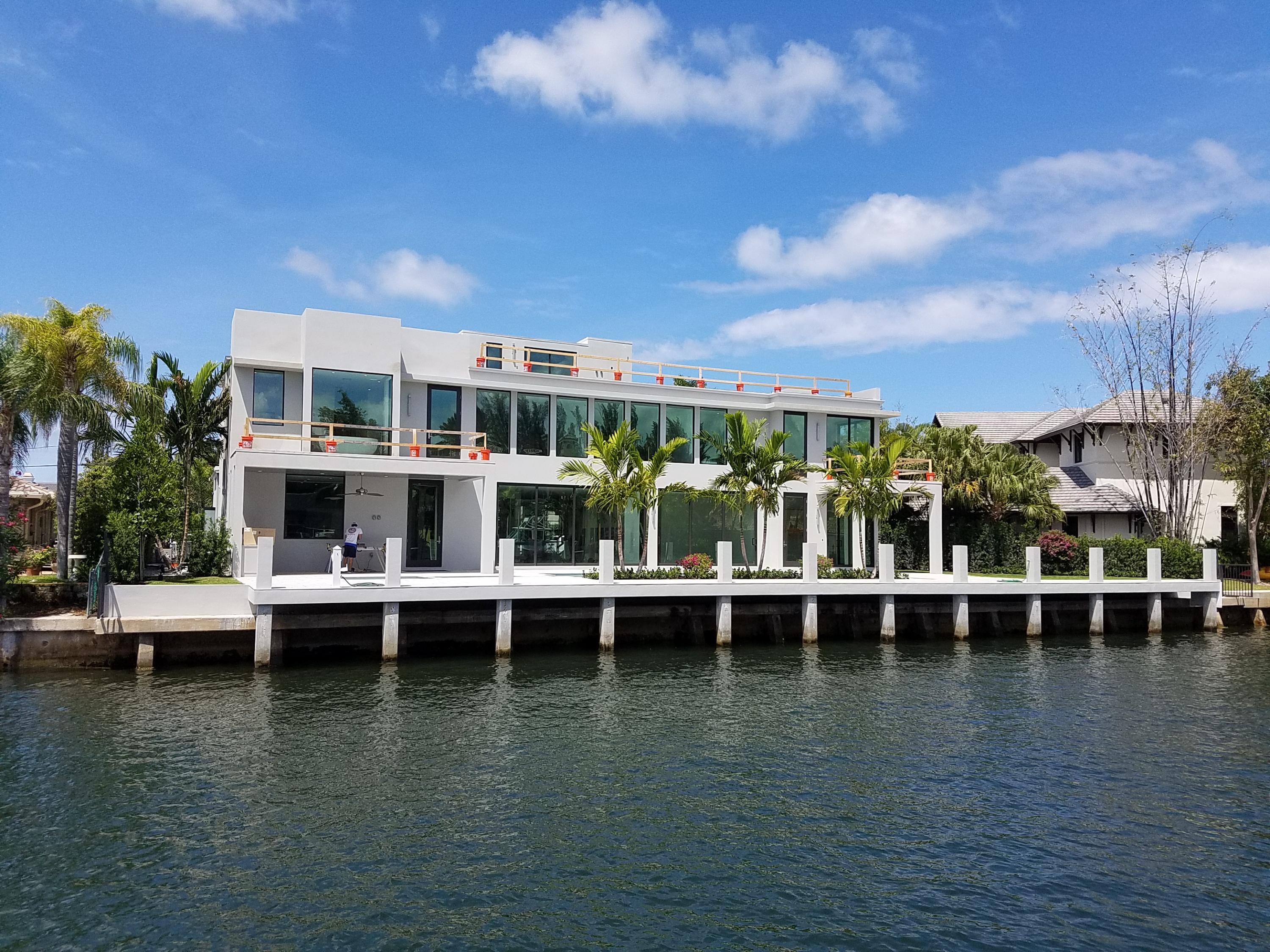 BRAND NEW LAKE ROGERS 5 BR 6.2 BA COMTEMPORARY/MODERN ESTATE 1 LOT OFF THE INTRACOASTAL OVER LOOKING SPANISH RIVER PARK. THIS SPECTACULAR ESTATE HAS CHEF KITCHEN, A MEDIA ROOM, BAR, WINE ROOM, EXERCISE ROOM,SUMMER KITCHEN, HUGE POOL/SPA PATIO AREA, 105 FT POUR CONCRETE DOCK, FIREPLACE, ELEVATOR, 3RD STORY HUGE ROOF TOP TERRACE W/ HOT TUB & PUTTING GREEN,ETC... WALK TO THE BEACH & SHOPS