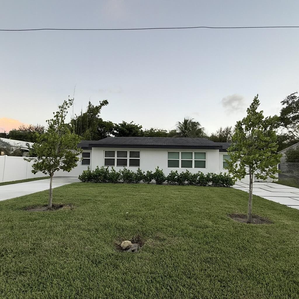 Welcome to this beautifully remodeled 4 bedroom home located just five blocks south of Atlantic Avenue and less than a mile from the beach. Enjoy a brand new kitchen with modern cabinets, sleek countertops, and stainless steel appliances. The layout creates a bright and inviting living space, perfect for relaxing or entertaining. Additional upgrades include hurricane impact windows, a brand new washer and dryer, fresh paint, upgraded flooring, and stylish fixtures throughout. This home offers the perfect blend of location, comfort, and lifestyle in the heart of Delray Beach. Conveniently close to shopping, dining, and the vibrant downtown scene, it's an ideal place to call home.