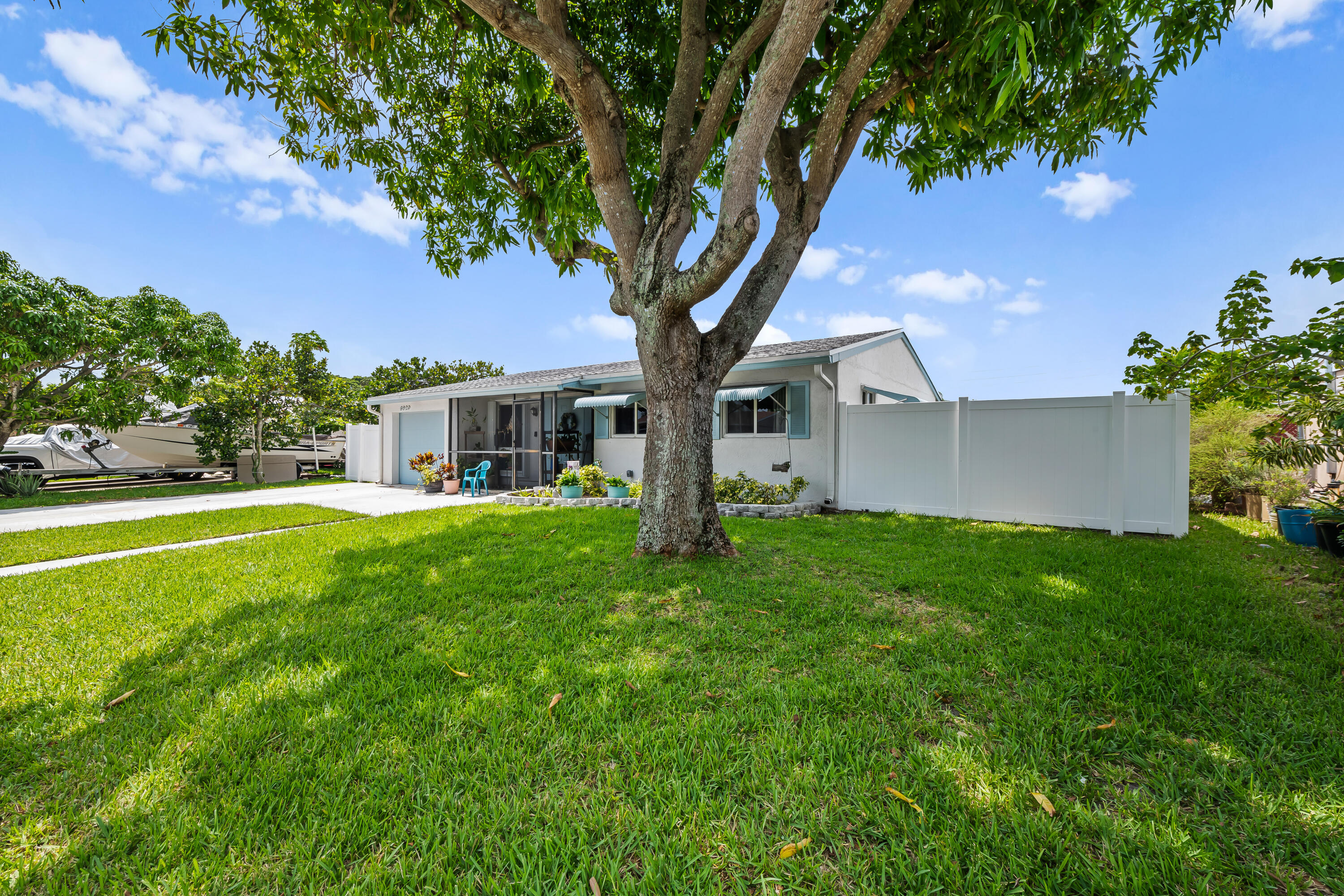 Beautifully maintained home featuring numerous major upgrades for peace of mind! Hurricane impact windows & doors throughout, impact garage door, plus accordion & clamshell shutters provide exceptional storm protection. New roof (2020), A/C (2025), & electrical panel (2024). The updated kitchen & wood-look porcelain tile flooring throughout create a modern, move-in-ready feel. The primary bath was remodeled in 2020, & the private fenced backyard (2021) offers plenty of space to relax or entertain, complete with a storage shed & automatic sprinkler system. New smoke alarms installed. Conveniently located near Fern Forest Nature Center, Cypress Creek Greenway, shopping, dining, parks, & major highways. NO HOA!