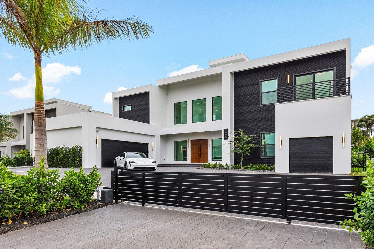 OPPORTUNITY!!!! TURNKEY, TENANT IN PLACE AT $34,000.00 PER MONTH UNTIL SEPTEMBER 6..... BUY THIS TURNKEY FOR YOURSELF OR INCREASE RENT FOR SEASON BY 30%... THIS IS THE OPPORTUNITY WITH OPTIONS THAT YOU HAVE BEEN LOOKING FOR! $565,000.00 Below Cost Approach Appraisal | No HOA | Contemporary Beach Estate
This stunning contemporary beach estate offers an impressive gated entry, ample guest parking, and a 3-car garage with high ceilings ideal for car lifts. Step through oversized double doors into soaring 25-foot ceilings filled with natural light, highlighted by a custom floating staircase and modern, elegant fixtures.
The north side features a custom kitchen with 12-foot ceilings, premium appliances, and a design that perfectly blends indoor-outdoor Florida living for effortless entertaini The first-floor laundry is conveniently located near the air-conditioned single-car garage.
Upstairs, 11-foot ceilings complement a thoughtful layout with a luxurious master wing complete with a morning kitchen, large terrace, and spa-like ensuite. The south side includes a bright open loft with wet barideal as a game room or home officeplus three additional bedrooms, two bathrooms, and a second laundry room.
Ascend to the rooftop terrace, over 50 feet above sea level, to enjoy breathtaking ocean sunrises and preserve sunsetsan unforgettable daily retreat. Outdoor amenities include a custom pool and spa, putting green, outdoor kitchen, and cabana bath.
Located less than a five-minute walk from one of the country's premier beaches, this Juno Beach estate perfectly combines sophisticated design with unparalleled lifestyle convenience.