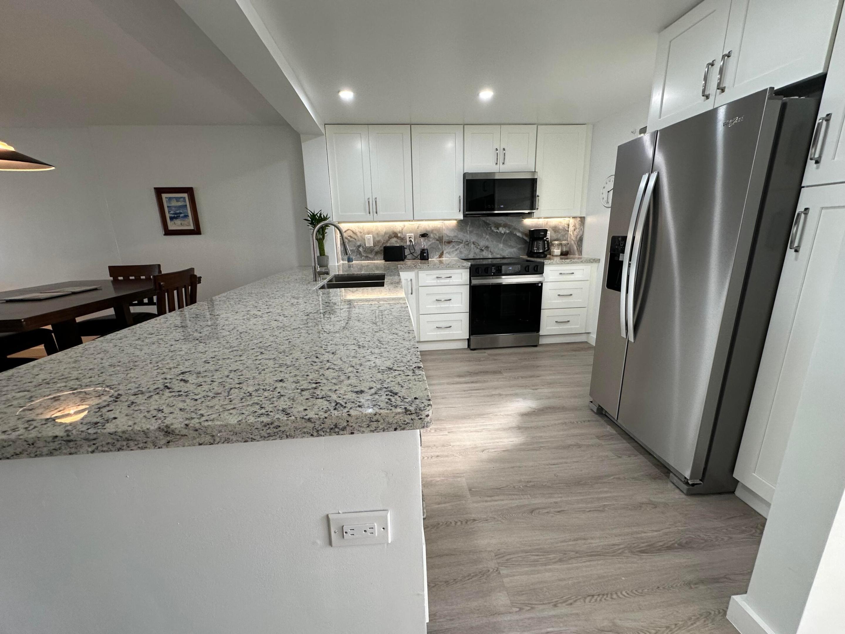 Short Term or Yearly Rental. Amazing fully furnished 2 bed 2 bath condo with almost 1,200 sqft and breathtaking water view in this 55+ community. The condo has been fully updated with open floor plan, brand new floors, updated kitchen, no popcorn ceilings, brand new furniture, and impact windows & doors! Enjoy a lovely cross breeze & breathtaking sunrises and sunsets views. The spacious primary has tons of storage and closet space and guest bedroom is quite ample with walk-in closet. Less than 2 miles to FLL airport and minutes from the beach and Dania casino. Close to Publix, Walgreens, 7-11, and other amenities. Easy access to major highways. Enjoy the clubhouse renovated pool. Don't miss this rare opportunity to live in a vibrant, well-located community with unbeatable amenities!