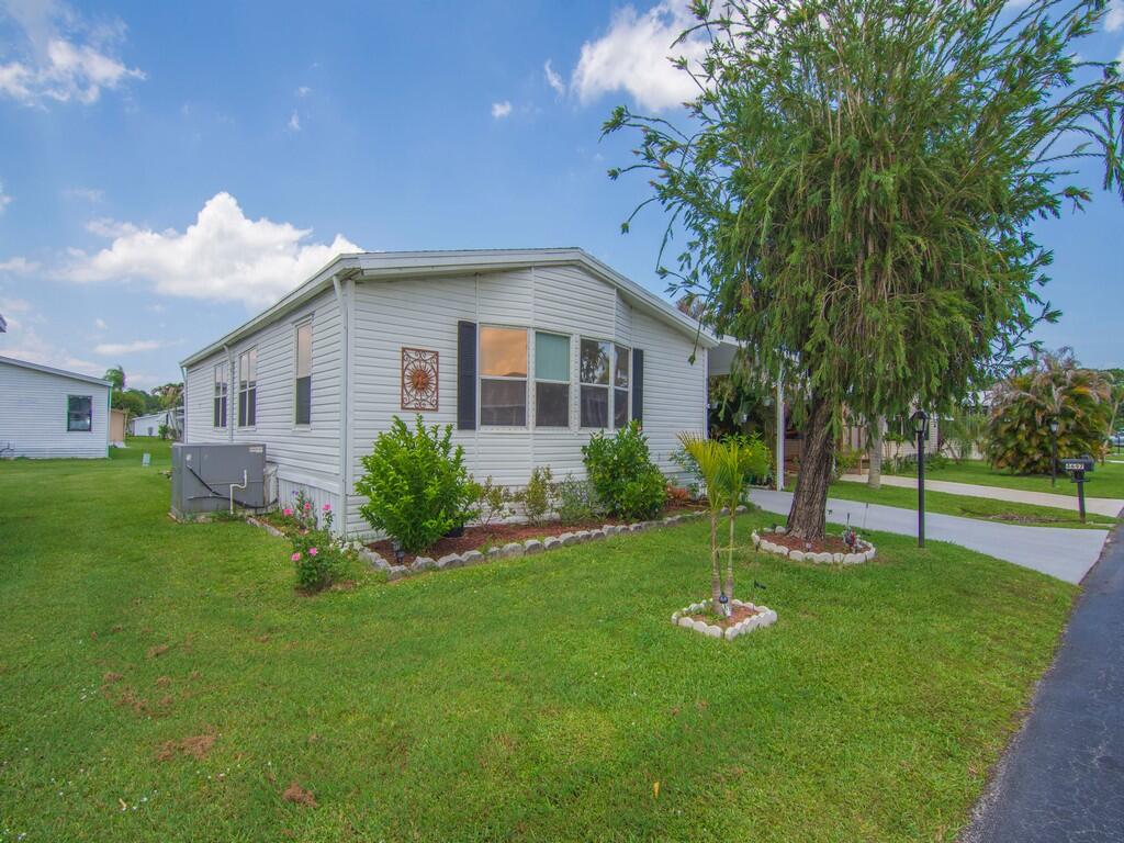 COME AND SEE this beautifully REMODELED 2 bedroom, 2 bathroom home in the 55+ community of Pinelake Gardens in Stuart!  New vinyl plank flooring throughout!  2 master suites!  Open floor plan makes this home perfect for entertaining!  Schedule your private showing today!