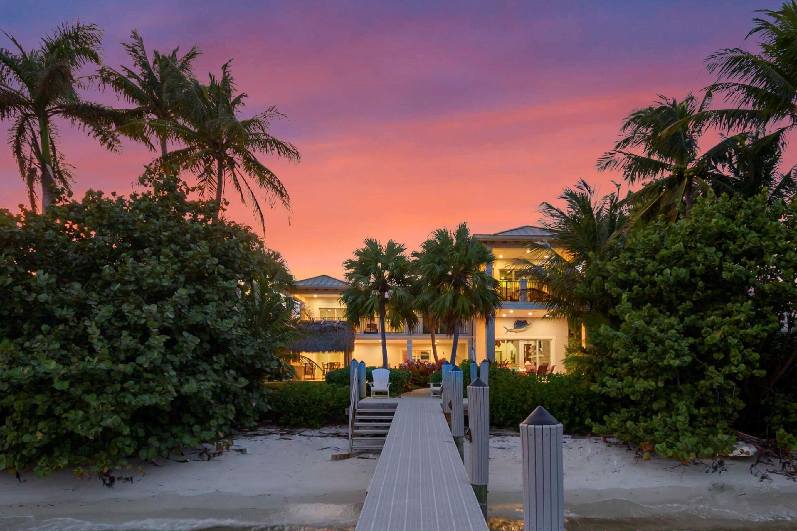We are proud to present this rare, one acre luxury waterfront Villa to you. Tucked into a very quiet end of a Cul-de-Sac, this beautiful home offers a maximum of privacy featuring a private beach, a 280 ft private boat dock and endless water views of the lagoon. Take your boat out to the ocean in less than two minutes or enjoy the serenity of your spacious backyard. Invite your friends over for a fun night in the games room, have a barbecue cook-out by the pool, or enjoy the views with an ice-cold ''lemon drop'' from the sun deck or bar. This home was completely rebuilt in 2007 and designed to embrace the Florida waterfront lifestyle. Bitcoin & Seller Financing available. FLL and PBI airports are only 20min away,