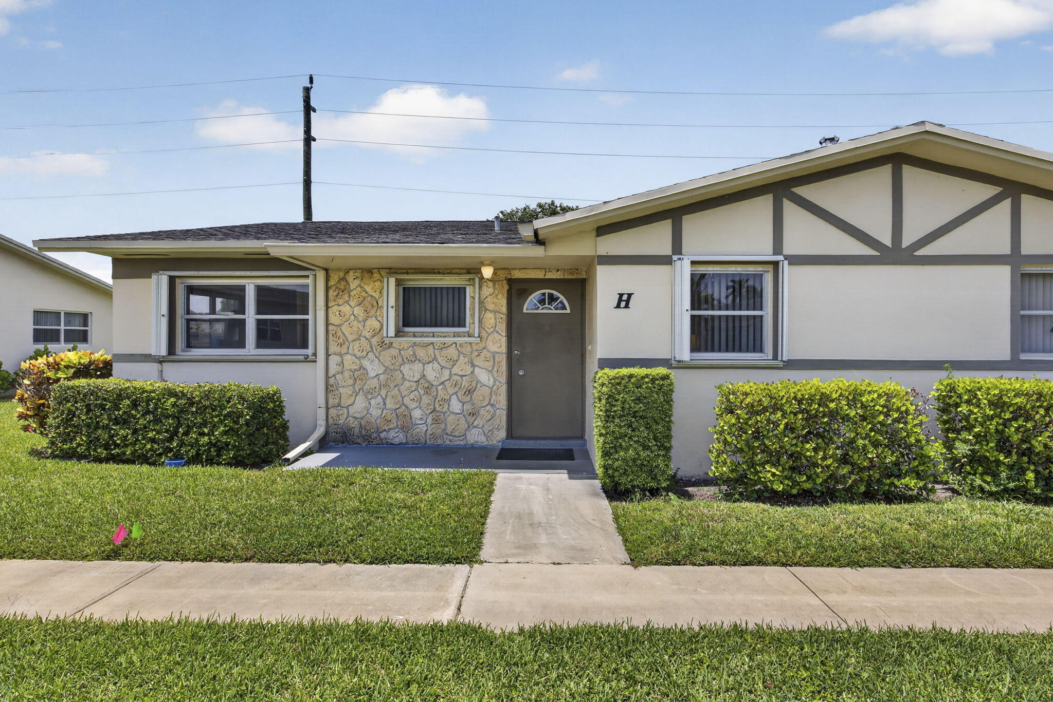 Welcome to this beautifully maintained villa in the desirable 55+ Emory Community of Cresthaven. This move-in ready home features tile flooring throughout, fresh interior paint in light, neutral tones, and abundant natural light thanks to two windows in each bedroom. The updated kitchen is equipped with stainless steel appliances, including a range, dishwasher, and refrigerator. Enjoy relaxing in the enclosed patio with a ceiling fan, overlooking the canal for added privacy and peaceful views. Accordion shutters throughout provide convenience and storm protection. Both bathrooms feature walk-in showers, including the primary ensuite. Additional updates include an updated electrical panel, A/C replaced in 2017, and water heater installed in 2011. Multiple storage closets offer plenty of space for organization. Residents of Emory at Cresthaven enjoy an active lifestyle with outstanding amenities, including a heated pool, auditorium, fitness center, library and computer room, billiards and card rooms, shuffleboard, and bocce ball courts. Emory is a 55+ community where at least one occupant must be 55 years of age or older. No permanent residents under 21 are permitted. The community is pet-free, does not allow leasing during the first 2 years, and each villa includes one assigned parking space. The association also requires a one-time $1,500 capital contribution fee from each new buyer at closing. Conveniently located near shopping, dining, medical facilities, and major roadways, this home offers comfort, convenience, and low-maintenance living.