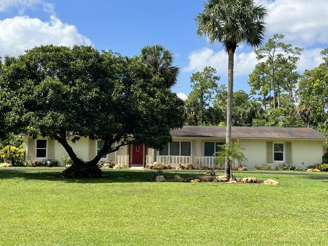 Unique find! CBS 3 bedroom 2 bath home with attached 2 car garage and detached 672 sq. foot garage, pool, large screened porch and much more all on almost an acre minutes from everything; airport, shopping, beach, etc. Like living in the country in the middle of the city!