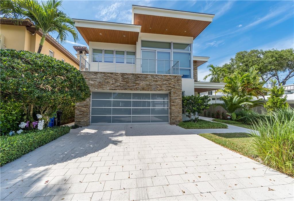 Hidden Gem in Rio Vista! Highly sought after Ponce De Leon address!   Step inside  this modern, waterfront home and be transported into tranquility -Enter into a grande open living space where the outside Lush verdant gardens bring the outside in -  This  home offers  the ultimate in intimate privacy yet grande enough to host large social gatherings -The third floor has a secondary living space with wet bar and half bath plus unbelievable outside space that   offers the most breathtaking views of the Ft Lauderdale skyline. This property is one of a kind!   Close to everything Ft Lauderdale has to offer from fine dining, shopping, entertainment and beaches - Airport is less than 10 minutes away- this home has it all -More pics to follow-