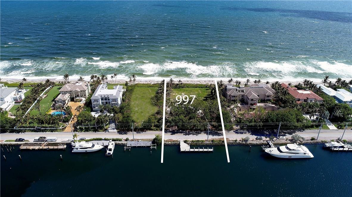 Rarely available 160 ft of ocean frontage + 160 ft of direct intracoastal. Impressive vacant lot (47,823 sf/285 ft deep x 160 wide) on South end of exclusive Hillsboro Mile. 1 of only 60 properties. Enjoy high elevations with unobstructed panoramic ocean and intracoastal views. This unique and valuable property is prime for development of a substantial oceanfront compound. Option for seller to build a stunning seaside estate for buyer, the proposed renderings are in this listing. Must see! This is the ultimate oceanfront mansion for both beach and boating enthusiasts. Concrete dock, perfect for the mega-yacht. Visit video link to see true beauty of this property.