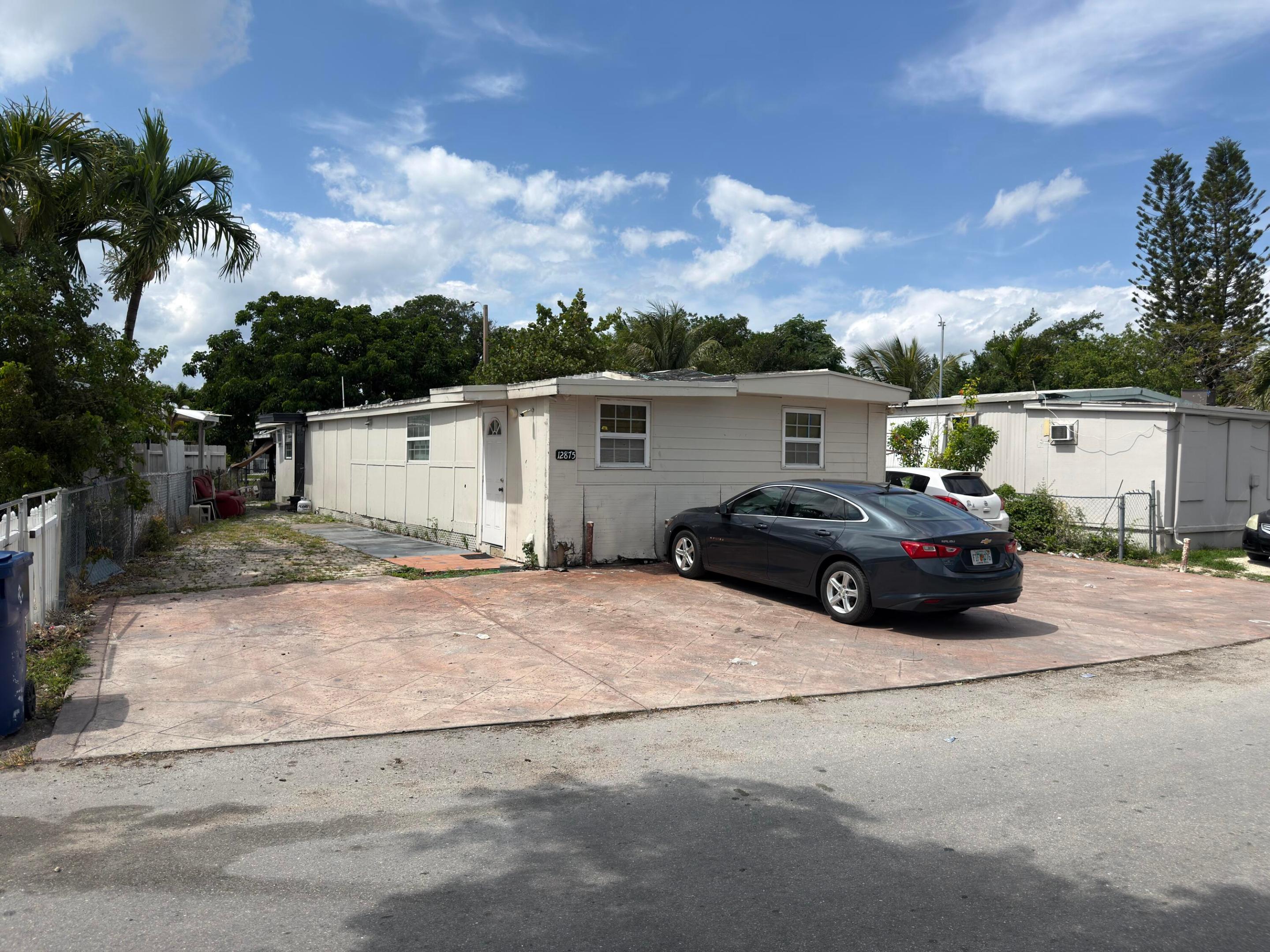 Income-producing manufactured home located in University Lakes Mobile Home Park in Tamiami. Property is configured with four efficiency-style units currently generating approximately $5,000/month in rental income with tenants in place. Strong demand for affordable housing in the area provides consistent occupancy and cash flow potential. Conveniently located near major highways, shopping, dining, and employment centers. Potential portfolio opportunity: seller owns three additional manufactured homes within the same community and is open to selling all four properties as a package. Motivated seller. Land not included.