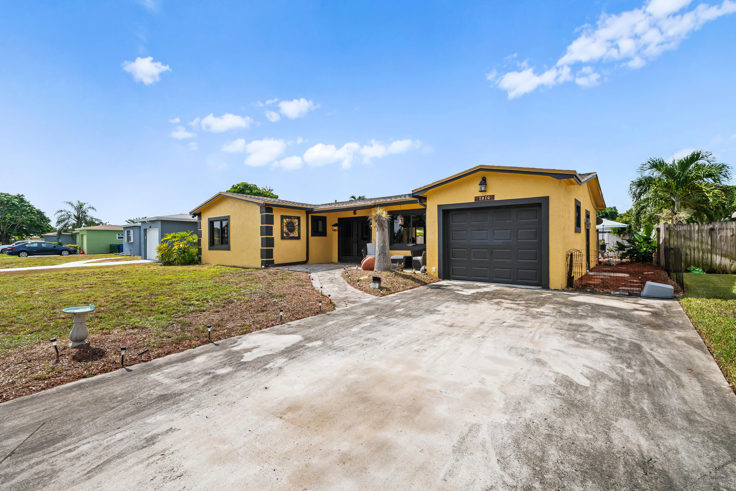 Entertainer's Dream in Margate!    Welcome home to this almost entirely updated 3-bedroom, 2-bathroom pool home built for the South Florida Lifestyle! Step inside to find a fully remodeled gourmet kitchen, brand-new flooring throughout, and a spacious full laundry room!! Impact windows offer both peace of mind and energy efficiency!!  Florida living at it's best! ! With an outdoor oasis: sparkling pool and spa, a cozy fire pit area for cool evenings, and an outdoor wet bar with cabana bath — perfect for hosting family and friends year-round!! Walls of sliding glass doors open completely to blend indoor and outdoor living seamlessly, creating the ultimate hospitality home.!!!  New roof!! Newer A/C !!! Hurry !!! Your new home awaits!!! Schedule your private showing today!!!
