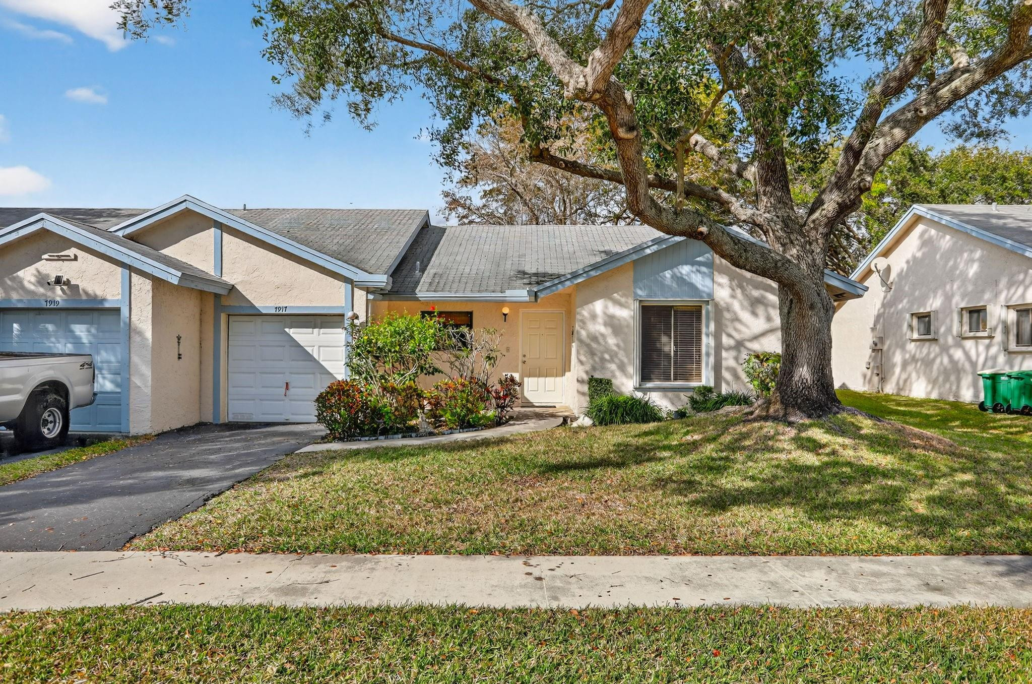 Stunning waterfront beauty on a quiet cul-de-sac street is waiting for you & your pet to enjoy nature & beautiful sunsets right outside your patio doors! Light & bright kitchen-cheerful window above sink, upgraded cabinets, granite & appliances. Living room:Spotless picture windows & million-dollar golf & water views with plenty of room for creative furniture placement! Private primary bedroom suite:stunning view, walk-in closet &  remodeled, spa-inspired bath-inviting shower, nicely placed accent tile, modern vanity & mirror. Desirable split plan with separate 2nd bedroom hallway for more privacy. Guest bath:Relaxing soaking tub & beautifully upgraded. Vaulted ceilings! Sand dune paint scheme & stunning uniform tile throughout pulls it all together! One car garage-clubhouse & pool too!!