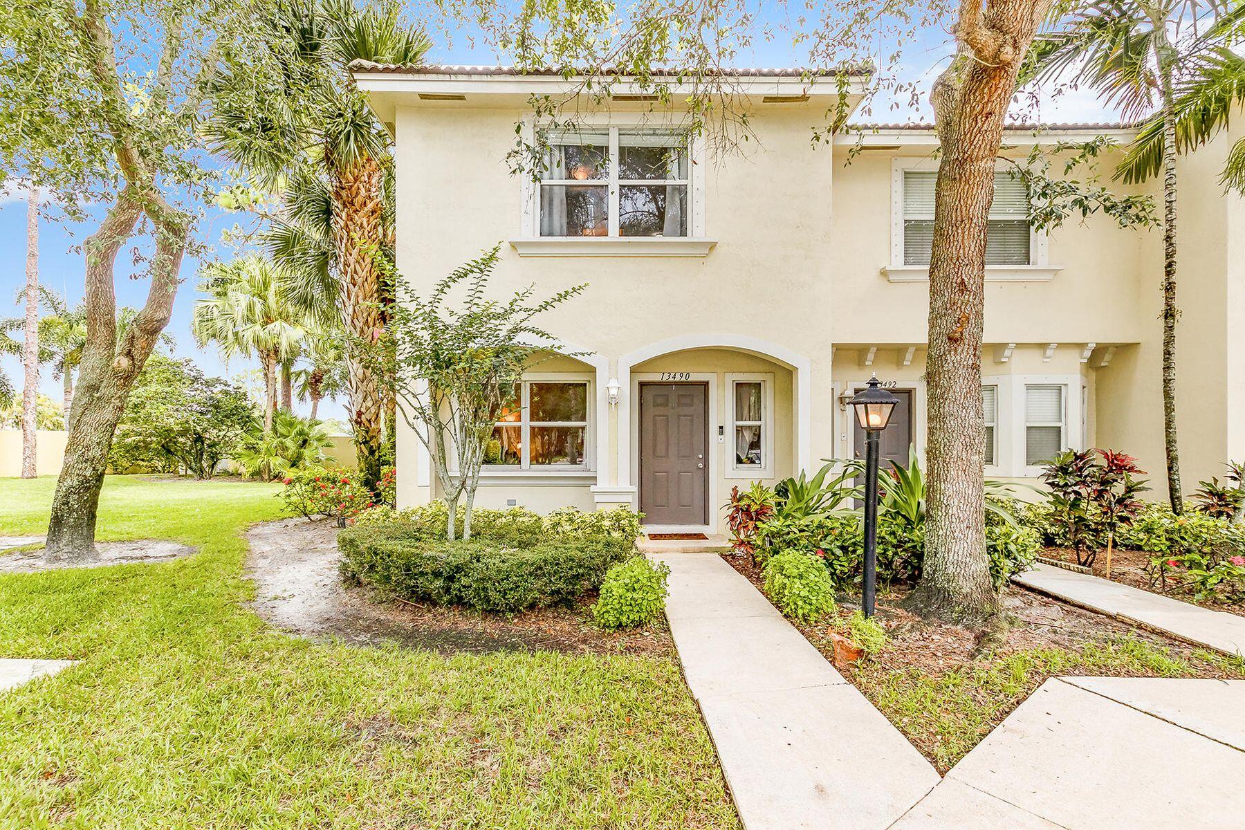 Located in the heart of Wellington, this 2-bedroom, 2.5-bath townhouse offers an incredible opportunity for homeowners and investors alike. Just a short walk to top-rated schools, shopping, dining, and everyday conveniences, the location simply can't be beat. With strong rental demand in the area, this property presents excellent income potential for both annual and seasonal rentals.  Priced aggressively, this home provides the perfect canvas for a new owner to create their dream space. Add your own personal touches, updates, and renovations while building instant equity. The spacious floor plan features two generously sized bedrooms, each with its own private bath, plus a convenient half-bath for guests. Whether you're looking for a primary residence, seasonal retreat, or investment property this townhouse offers exceptional value and unlimited potential in one of Wellington's most sought-after locations.