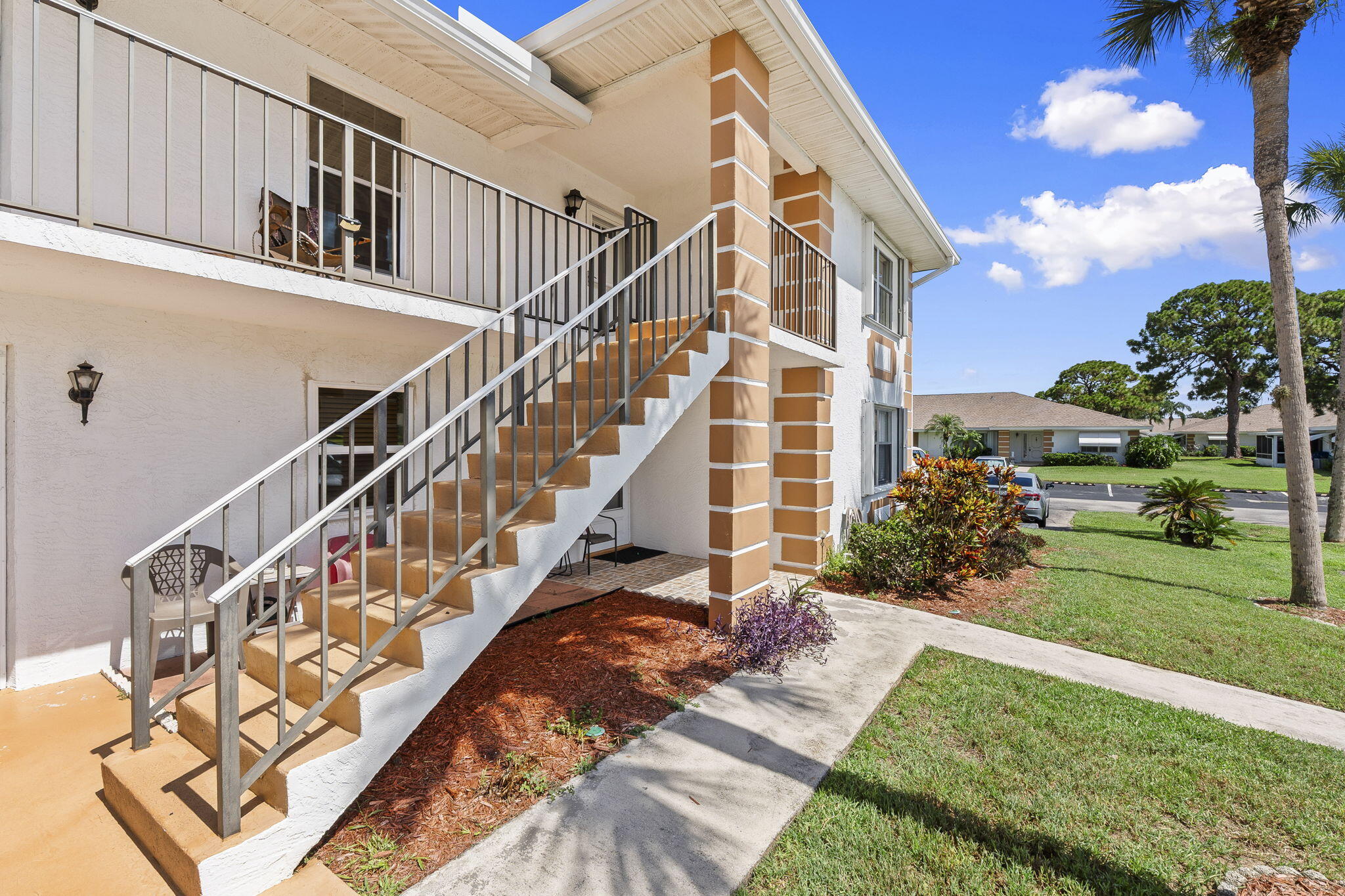 Beautiful second floor end unit located in the guard gated High Point of Fort Pierce community. This well-maintained condo features an opened entrance wall that creates a more spacious feel, abundant storage throughout, and an in-unit washer and dryer. The unit is being offered fully furnished. Enjoy peace of mind with accordion shutters for hurricane protection and a bright Florida room with sliding windows.  Residents enjoy a clubhouse, pool, tennis courts, and shuffleboard. The community also hosts a variety of activities including a Men's Club, Women's Club, Cornhole, Pickleball, card games, Bingo, and more.