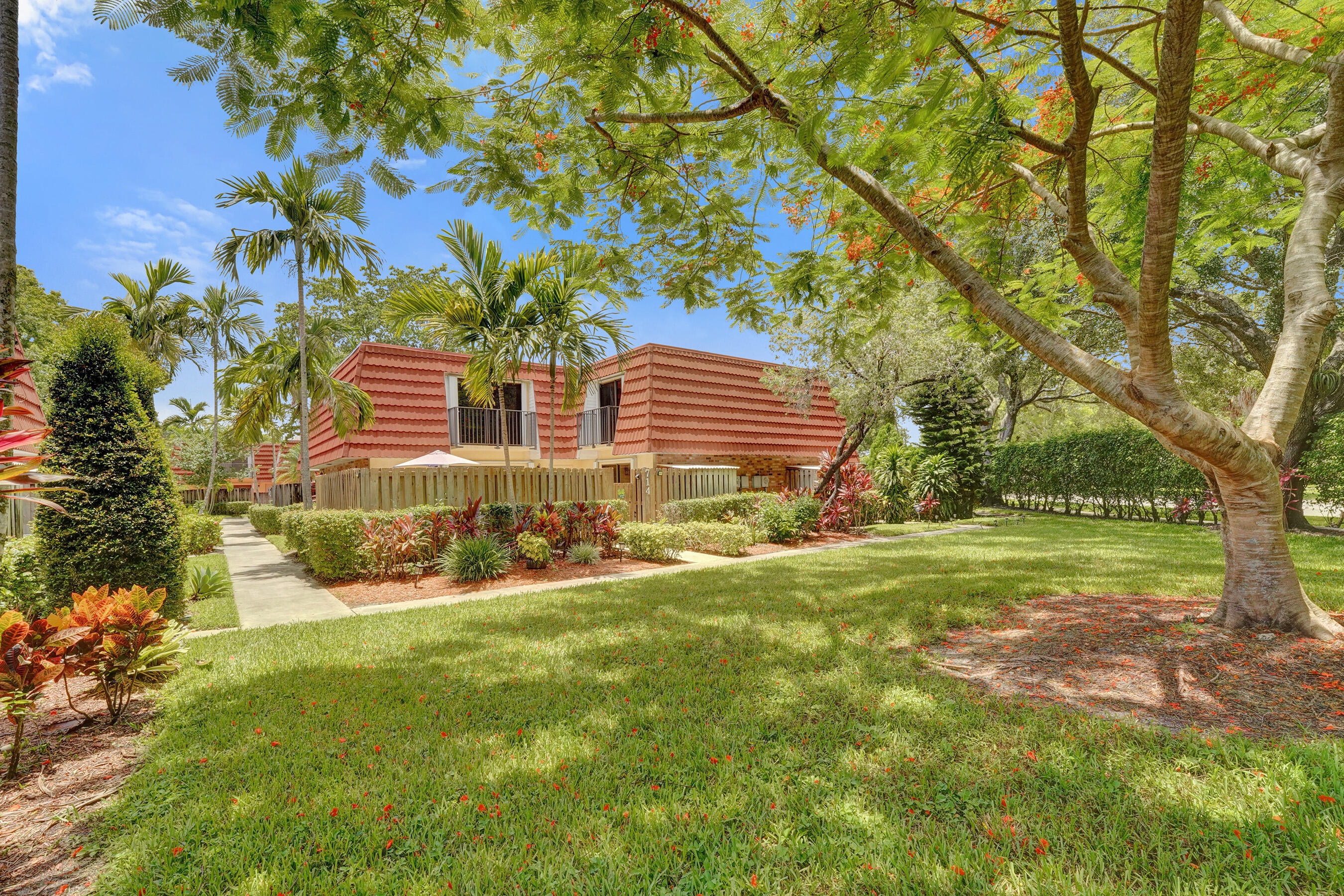 Super well maintained and updated 2 bedroom, 2.5 bathroom townhouse located in Waterford Courtyards in Jacaranda at Central Park in Plantation! Very private and large courtyard patio and beautiful green space views, updated kitchen with New Refrigerator, newer refaced cabinets and cabinet lighting, Remodeled bathrooms, full size washer and dryer in unit, laminate wood floors downstairs, recessed lighting, hurricane accordion shutters, alarm system, Automatic exterior lighting, new interior doors and electric switches and 2 assigned parking spaces plus guest spaces. HOA covers roof, building exterior, landscaping and cable and offers a community pool and resident car wash and is located a short distance from the Central Park complex, shopping, dining and entertainment!
