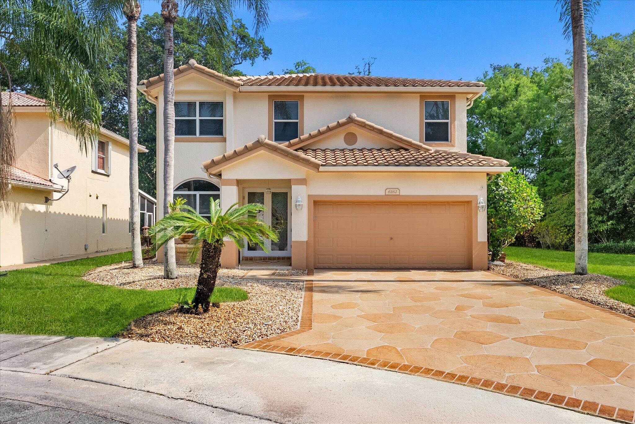 Welcome to this exceptional, fully renovated residence offering over 2,500 square feet of thoughtfully designed living space on a premier, oversized cul-de-sac lot. As an end home with a wraparound preserve setting, this property provides unmatched privacy and breathtaking views, creating a truly serene backdrop. Proudly owned by the original owners, the home has been meticulously maintained and upgraded, including a new roof (2023), new gutters with leaf filters, and a new A/C system (2025). The open-concept floor plan is enhanced by Mohawk RevWood waterproof flooring throughout the first floor, crown molding, and elegant picture frame molding accenting every window. Fresh interior and exterior paint further elevate the home's polished, move-in-ready appeal.  The chef's kitchen is a standout feature, complete with custom solid wood cabinetry, marble countertops, a marble backsplash, and high-end Electrolux appliances. All bathrooms also showcase marble countertops, with the primary suite offering custom marble flooring and refined finishes. Upstairs, all four bedrooms are thoughtfully positioned, including a spacious primary suite with an extended seating area overlooking the preserve. Designed for both comfort and entertaining, the outdoor space is truly impressive. Enjoy a newer screened patio enclosure featuring a retractable awning, outdoor wine fridge, and an expansive, hand-stained patio, balcony, and driveway. Impact glass windows and doors, along with accordion shutters, provide peace of mind and convenience. Additional highlights include a Kenmore washer and dryer conveniently located in a first-floor combination half bath/laundry room, custom Hunter Douglas window treatments throughout, an interior storage closet, and an irrigation system with high-efficiency sprinkler heads and digital technology. Every detail has been carefully curated, offering a rare opportunity to own a private, oversized lot with high-end upgrades and custom features throughout. This amazing home is located in the highly sought-after, gated community of Regency Lakes within the Osprey subdivision, offering 24-hour security, lawn service, AT&T 1-gig fiber internet, and ADT home alarm system monitoring. Residents enjoy resort-style amenities, including access to two community pools, tennis and pickleball courts, a basketball court, scenic walking trails, a clubhouse, and a fitness center. Conveniently located near major highways, A-rated schools, premier dining, and shopping destinations, this home offers the perfect balance of privacy, comfort, and convenience.