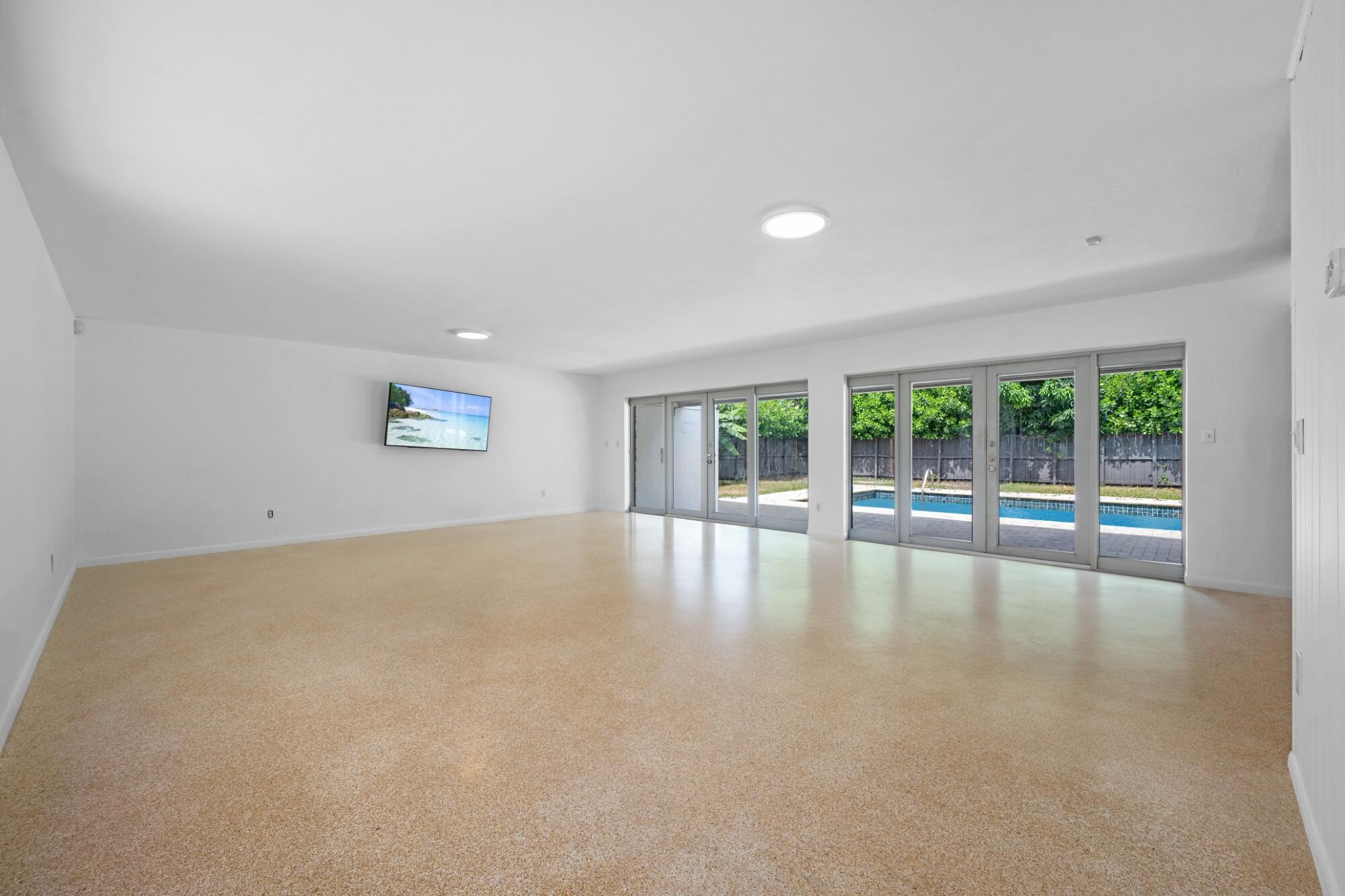 Welcome to Paradise. The property is located in this well-appointed single-family residence in Highland Woods Sec 1, Miami, FL. This thoughtfully designed home offers 2,271 square feet of above-grade finished living space across one story, providing convenient single-level living. The home features three spacious bedrooms & two full bathrooms, accommodating various lifestyle needs. A two-car garage provides ample vehicle storage & protection. Situated in the established Highland Woods Sec 1 community, this property presents a solid opportunity for those seeking practical, comfortable residential living in Miami. Home already has a metal roof & impact windows & sliding glass doors throughout.  Build your dream home hear or remodel the existing large home to meet your needs. Cash only.
