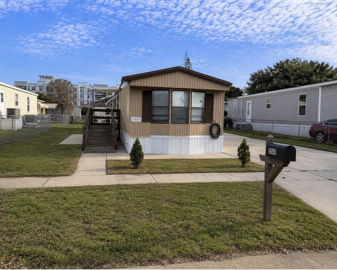Move-in ready manufactured home now available! Own the land & home!! Recently updated, 2 bed/2 bath home in the Shire. Newer electrical, plumbing & A/C. Other updates include; wood cabinets, countertops, appliances, sub flooring with wood laminate flooring & water heater. Wheelchair ramp has been added as well as widened doorways for wheelchair access. Open floor plan features an eat-in kitchen with updated lighting & newer appliances. The oversized 16X12 storage shed  w/ electricity can also be used as a workshop. Inside laundry room includes washer and dryer. Furniture & tools are negotiable.