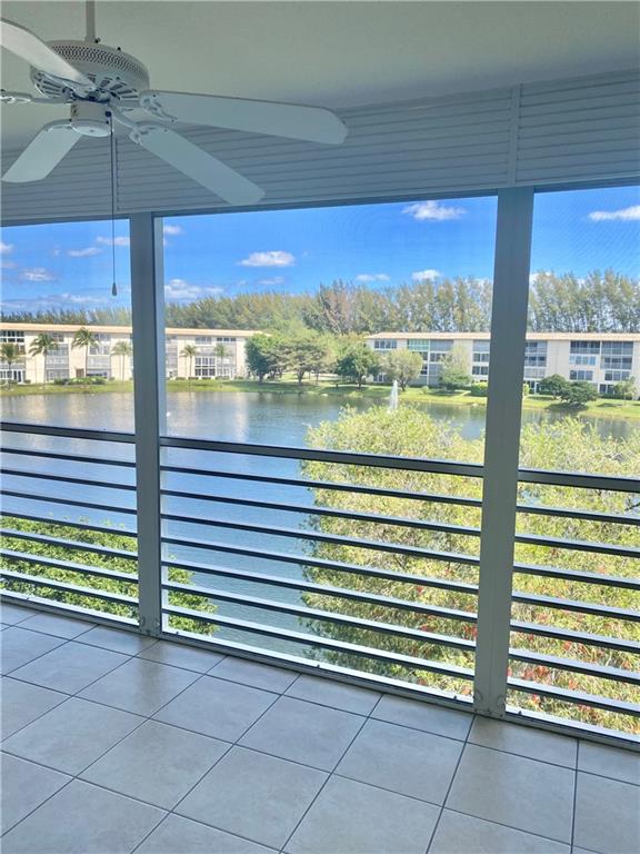 Lake view with fountain. Updated Kitchen. Clean, move-in condition. No leasing first 2 years, no pets.  55+ Community, (1 Occupant must be 55) Gated Community offering a non-membership country club lifestyle with 18 heated pools, fitness center, tennis courts & pickle ball courts, Restaurant, Courtesy buses and much more!Assoication requirements:  20% down, 700 credit score, (1) vehicle assigned parking space.