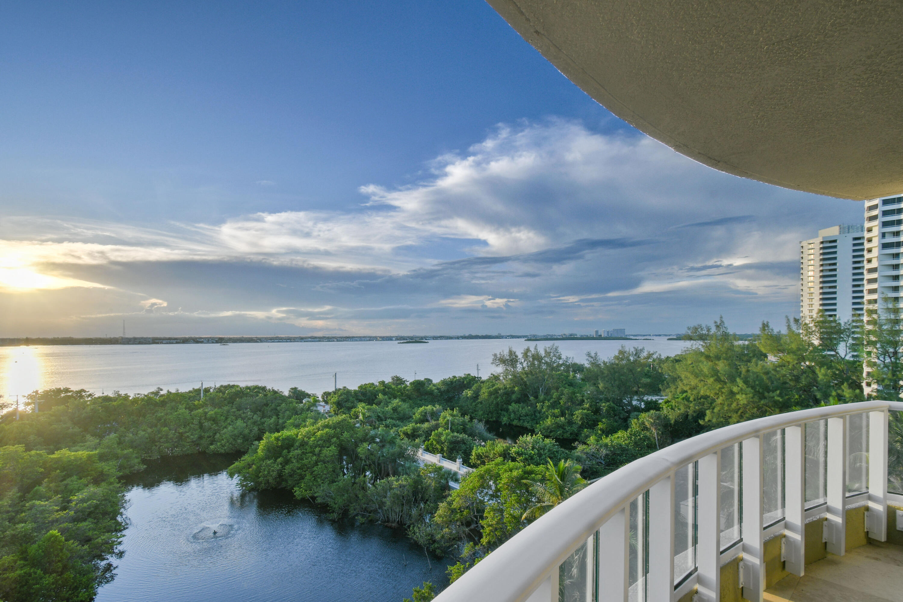 Experience unrivaled coastal luxury in this exquisite 3-bedroom, 3.5-bath residence at the prestigious Ocean's Edge on Singer Island.  Offering captivating views of both the Atlantic Ocean and Intracoastal Waterway from every room, this boutique enclave of only 40 private residences embodies the perfect balance of oceanfront tranquility and resort-style sophistication. Step directly from your private elevator into an elegant foyer, where a grand entryway opens to an expansive great room bathed in natural light. Floor-to-ceiling windows frame breathtaking water views in every direction, creating a serene and inviting atmosphere.  Throughout the home, high-end fixtures and finishes, custom blinds, built-in entertainment centers, a whole-home water filtration system, and porcelain tile flooring elevate the space beyond the ordinary.  The gourmet chef's kitchen is designed for both beauty and performance, featuring Miele double ovens and warming drawer, Miele espresso maker, Sub-Zero refrigerator and wine cooler, Wolf gas stove with pot filler, and sleek quartz countertops with a custom backsplash. The open-concept layout allows for uninterrupted water and skyline views, creating a seamless flow between the kitchen, great room, dining area, and the spacious outdoor balcony, the perfect setting to take in sweeping Intracoastal vistas and Florida's renowned sunsets.  The primary suite offers ocean and southeast exposures with a wraparound balcony, ideal for enjoying sunrise-to-sunset views and the twinkling evening skyline of West Palm Beach. It includes his-and-her walk-in closets with custom built-ins and a spa-inspired bathroom featuring dual vanities, a spacious walk-in shower, a jacuzzi tub with sunset views, and a private water closet with a Toto washlet.  A thoughtfully designed split floor plan ensures privacy, with the second en-suite bedroom offering serene water views and private balcony access. A third bonus room, ideal as an office or den also provides balcony access, a full closet, and a full bathroom.  Nestled along Singer Island's exclusive residential corridor, Ocean's Edge delivers a true five-star lifestyle. Amenities include 24-hour manned security, elite concierge services, a state-of-the-art fitness center, an oceanfront club room with catering kitchen, a media room with theater screen, and a heated beachside pool and spa.  Enjoy direct access to Florida's most pristine beaches, state parks, water sports, and world-class dining, shopping, and golf.   Conveniently located near Downtown West Palm Beach, Jupiter Inlet, Juno Beach, Palm Beach Island, PGA Boulevard, and PBI Airport this residence defines luxury coastal living at its finest.  Public Remarks: Ocean's Edge is not subject to building inspections, as they apply only to structures that are 25 years or older. Their 2-year concrete restoration was project was finished in October 2024. Last year, they completed their structural integrity reserve study and updated their standard reserve study, both of which are available on their owners' website. All assessments have been paid.