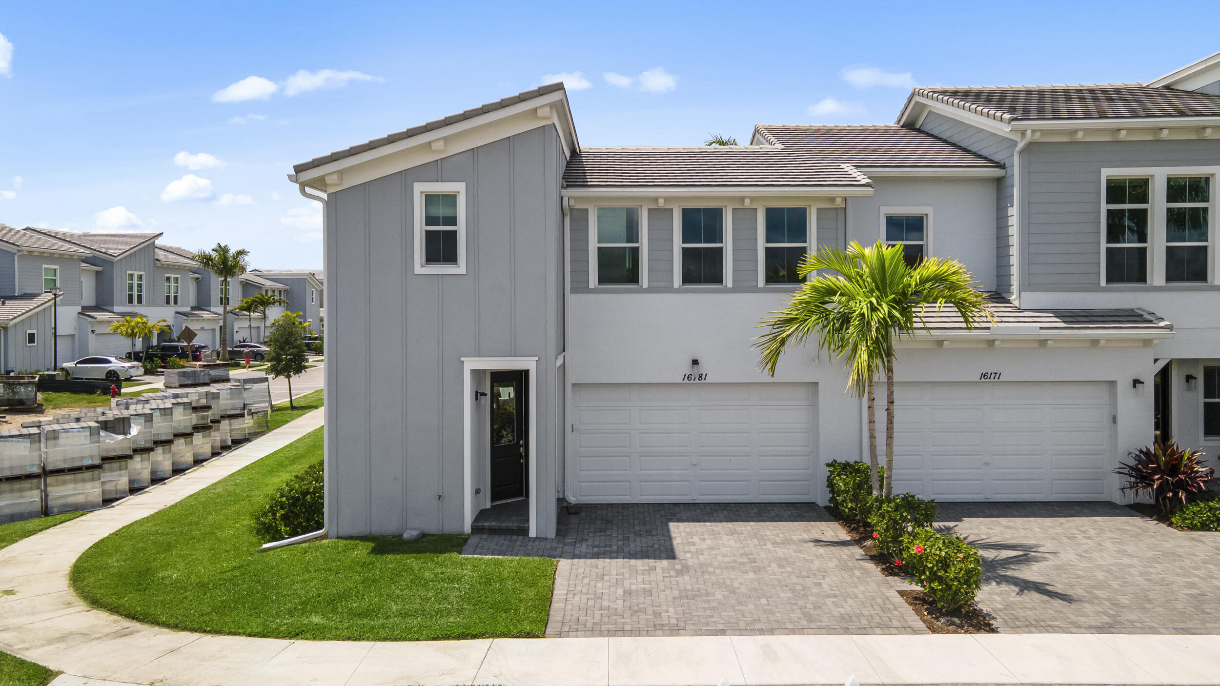 Welcome to this beautifully appointed and fully furnished Aventura Model townhome located in the highly desirable community of Westlake. Built in 2022, this move-in-ready residence offers a spacious open-concept floor plan designed for modern living, seamlessly connecting the living, dining, and kitchen areas, perfect for both everyday comfort and entertaining.  The heart of the home is a stunning upgraded kitchen featuring modern cabinetry, quartz countertops, stainless steel appliances, and ample prep space, creating a true chef-inspired environment. Stylish finishes and furnishings throughout make this a turnkey opportunity ready for immediate enjoyment. Offering 3 bedrooms, (Owner's suite on the first floor) 2.5 bathrooms, and approximately 1,669 square feet of living space, this thoughtfully designed layout includes a desirable primary suite and comfortable secondary bedrooms, providing both functionality and flexibility.  Located within the master-planned community of Westlake, residents enjoy resort-style amenities including a lagoon-style pool, splash park, clubhouse, fitness center, playgrounds, dog park, and scenic walking trails, delivering a vibrant and active lifestyle.  Conveniently situated near a variety of shopping, dining, and everyday conveniences, including Westlake Landings and nearby retail centers, with additional restaurants, shops, and services continuing to come soon to the expanding Westlake Town Center.  Enjoy added peace of mind with proximity to top-rated medical facilities, including Palms West Hospital and Wellington Regional Medical Center, both just a short drive away.  With easy access to major roadways and everything you need nearby, this home offers the perfect balance of comfort, convenience, and community living.  Don't miss this exceptional opportunity to own a fully furnished Aventura Model home in one of South Florida's fastest-growing and most desirable communities, schedule your private showing today!