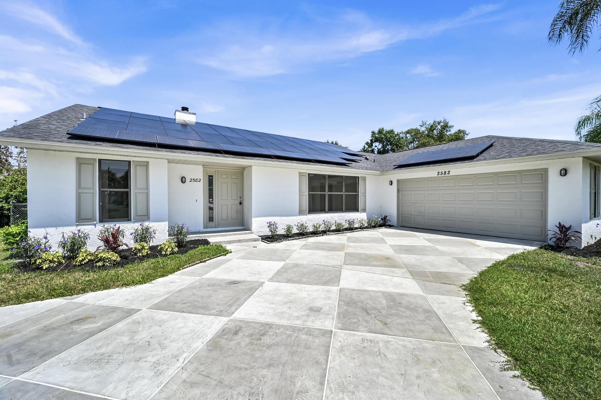 Welcome to this beautifully updated Port St. Lucie pool home offering the perfect blend of comfort, style, and functionality. Featuring a gorgeous remodeled kitchen with modern finishes, updated luxury vinyl plank flooring throughout, and an inviting open-concept floor plan, this home is designed for both everyday living and entertaining. Step outside to your private backyard oasis complete with a stunning in-ground swimming pool, perfect for enjoying Florida's year-round sunshine. The spacious layout provides seamless flow between the living, dining, and kitchen areas, creating a bright and airy atmosphere throughout the home. Conveniently located near shopping, dining, schools, parks, and major commuter routes, this move-in-ready property offers everything you need to enjoy the Florida l