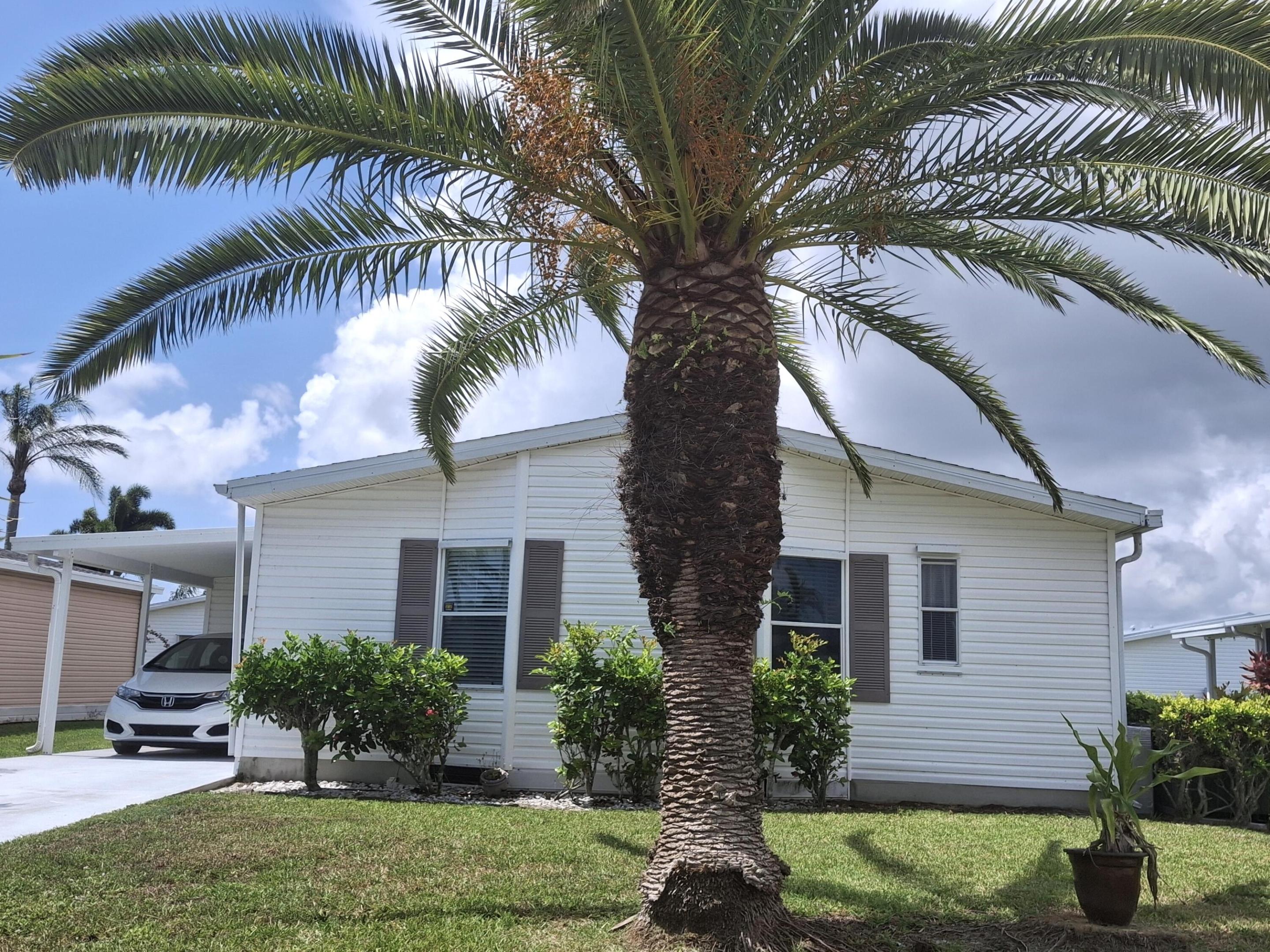 One of the best deals in Savanna Club for the price! 2/2 with a lanai on a quiet street. Roof 2024 Primary bedroom can fit a king sized bed. An outdoor patio on the back of the home to enjoy grilling outdoors. Open living and formal dining area with a dinette area off the kitchen. This home has fabulous tropical landscaping with all the palm trees. Motivated Seller. Come and view this house and make it your home. HOA includes cable, internet, trash, sewer and access to common areas. Savanna club has 3 clubhouses, 3 pools, 3 exercise rooms with modern equipment, a theater and an on-site restaurant. Pickleball, tennis, and more. There are also a great many clubs to join as well. Be as busy as you want to be. Within minutes to physicians, hospital and beaches.
