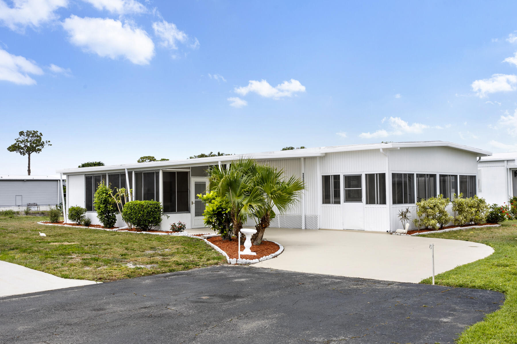 Location, Location, this beautifully remodeled home sits at the end of a quiet culdesac with serene canal views to enjoy the local wildlife.  This fully updated 2bedroom, 2bathroom home is located in a desirable gated community and offers modern finishes, thoughtful details, and exceptional outdoor living spaces. Step inside to luxury vinyl flooring throughout and a stunning new kitchen featuring white shaker cabinets, quartz countertops, stainless steel appliances, a pantry, recessed lighting, and stylish rattan pendant lights. The dining area includes a builtin buffet and coordinating rattan light fixture, creating a cohesive and inviting atmosphere. Enjoy two separate patio areas, a glass enclosed patio off the living room, perfect for relaxing or entertaining and a welcoming front patio with a storage shed that houses the washer and dryer. The spacious primary bedroom includes a walkin closet and a fully remodeled ensuite bathroom with a new vanity, toilet, tiled stepin shower, and updated fixtures. The guest bedroom is equally generous in size with its own walkin closet, and the guest bathroom has been completely renovated with a tiled stepin shower and new vanity. Additional upgrades include fresh interior and exterior paint, new fans and lighting throughout, a new AC unit, new water heater, and updated insulation and vapor barrier.  Active adult community with heated pools, pickleball courts, shuffleboard, dances, card games, bingo and so much more.  Community located close to plenty of shopping, dining and the local beaches.