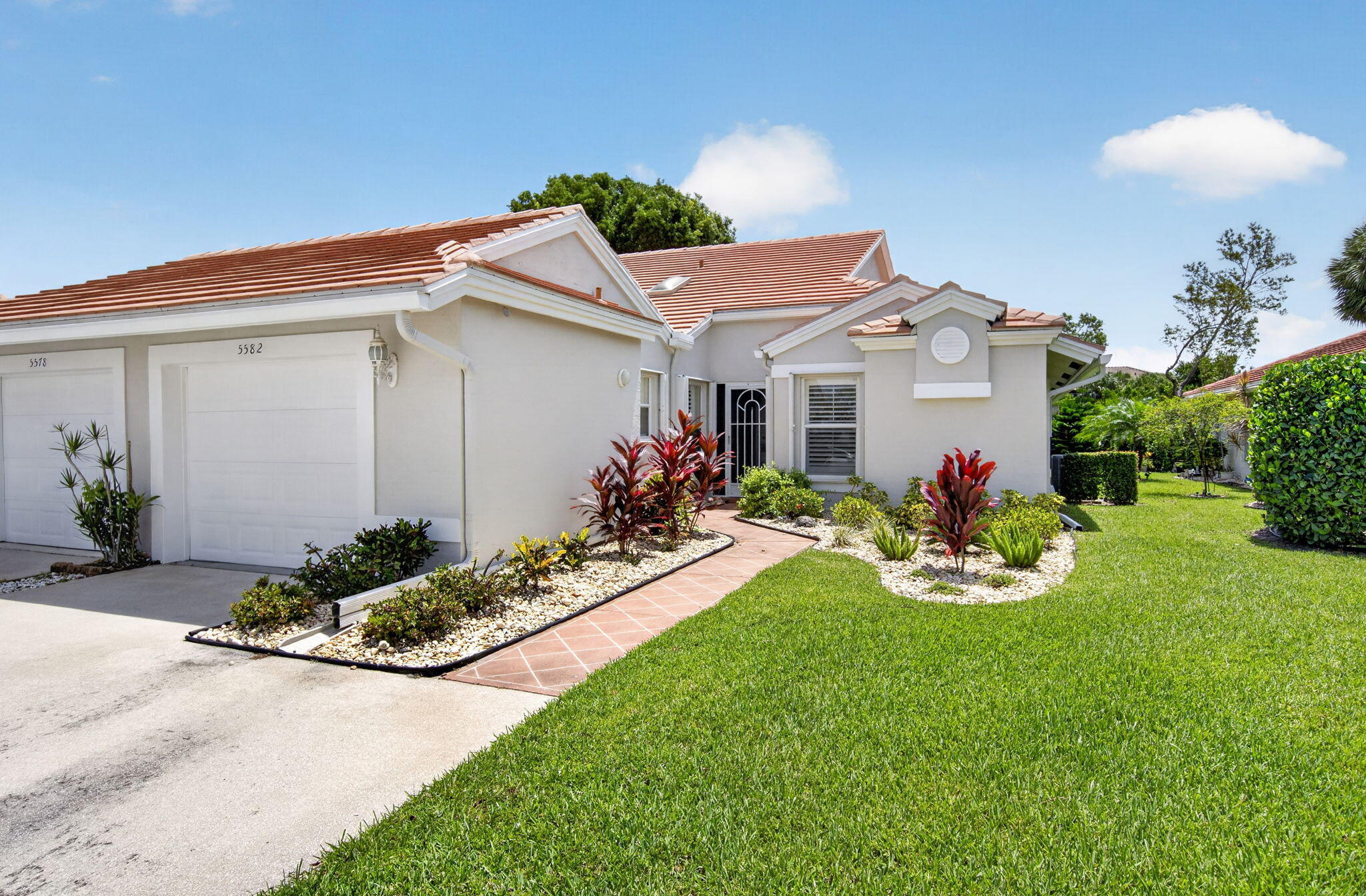 Completely renovated 2/2 Villa plus a den is being offer furnished (turn key). A must see. Just bring your toothbrush. Upgrades include kitchen cabinets, Granite counter tops & appliances plus both baths redone and all the flooring..Roof & accordian storm shutters 2015 & garage door. Brand new A/C system 2026.Outside just painted as well. Coral Lakes is a 55 + active gated community that offers a 72,000 sq ft clubhouse, indoor & outdoor pools, theater, café, fitness center, tennis, pickleball and tons of activities & clubs. Close to downtown Delray & Boynton Beach. Come join the fun. HOA fee includes cable & internet. Come make it yours.