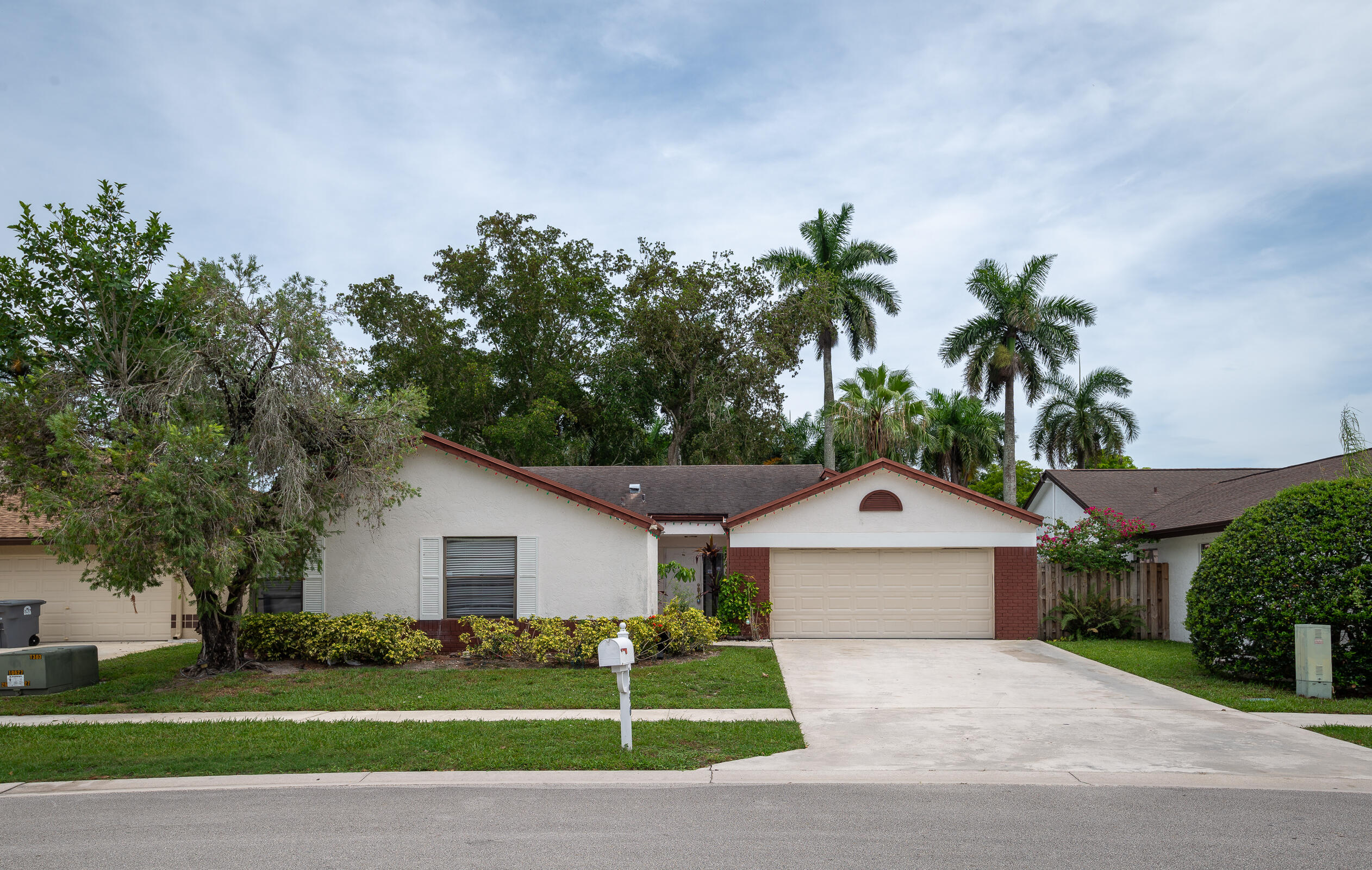 This 3-bedroom, 2-bathroom single-story home offers 1,672 square feet of living space and is ready for your personal touches. Ideally located just steps from Powderhorn Park, residents enjoy access to playgrounds, sports fields, basketball courts, walking trails, picnic areas, and expansive green spaces. Situated within a highly sought-after West Boca Raton school district and conveniently located near shopping, dining, and major commuter routes, this property presents an excellent opportunity to renovate and create your dream home in one of Boca Raton's most established family-friendly communities.