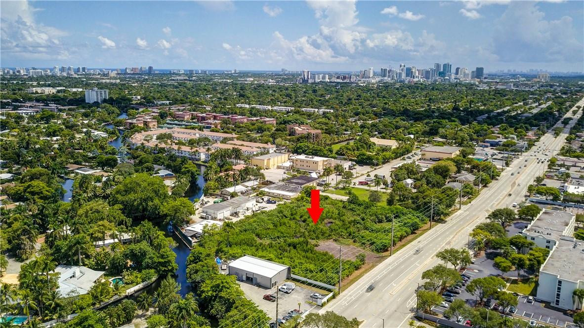 DEVELOPMENT OPPORTUNITY!! UNDER APPRAISED VALUE .Vacant commercial land 2.69 acres with 390' great exposure on Powerline Road . CB zoning allowing up to 150' . Across the street from Mills Pond Park . Close to I95 and downtown Fort Lauderdale All measurement are deemed accurate but should be verified. Seller financing available . More information .2100 NW 9 AVE is same as Powerline Road .