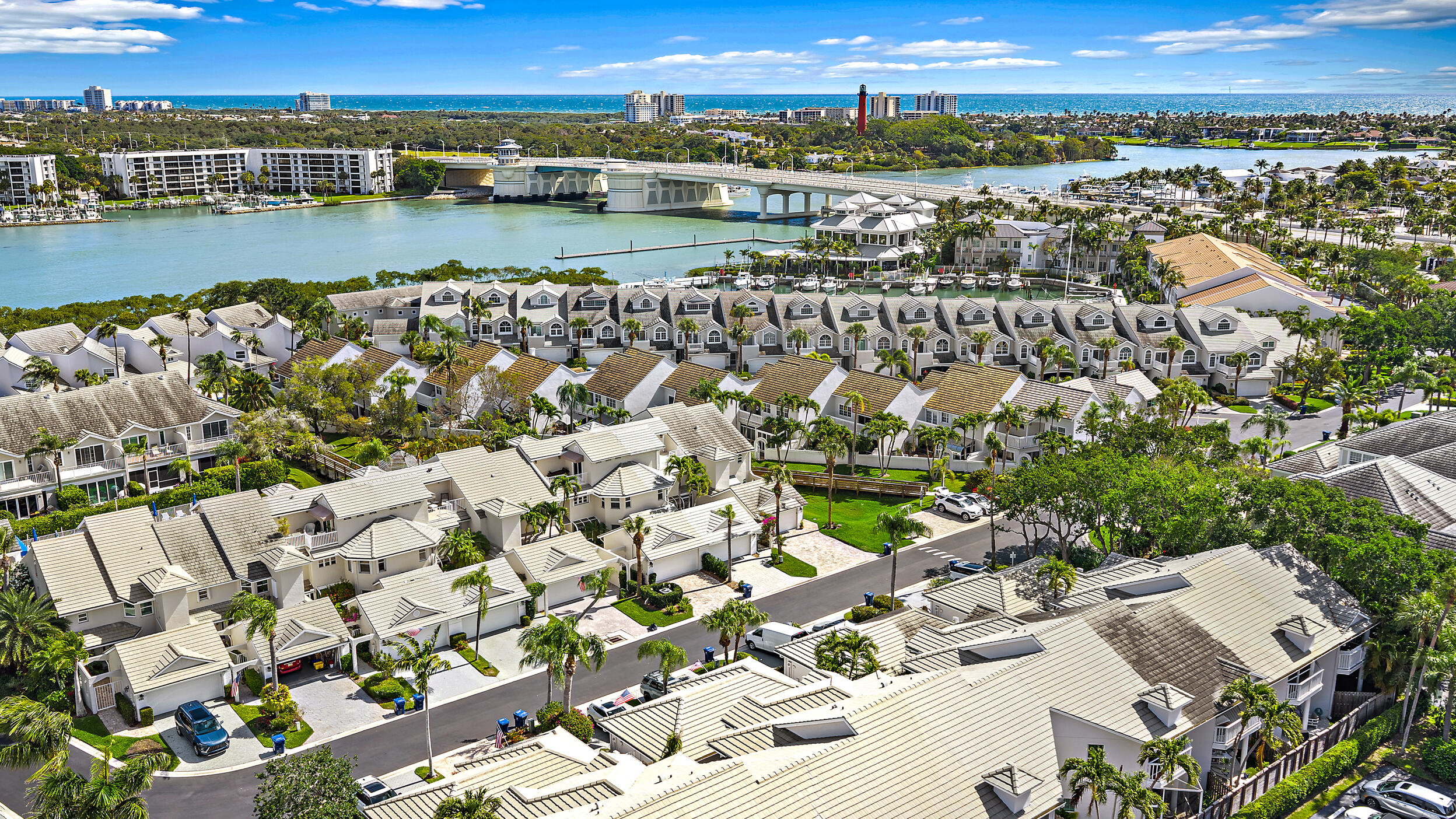 Under Construction/ Complete Coastal Renovation / Waterfront Furnished Season & Annual Available, Spacious 2-bedroom, 2-bath condo with high ceilings, no one above you, corner unit, and a rare real working fireplace—2 balconies an exceptional combination, stunning Intracoastal views, on site marina, located in a secure, man gated community, new walkway under the bridge to top waterfront dining hotspots including 1000 North, U-Tiki, Guanabanas, and Lucky Shuck and many more. Residents enjoy premium amenities, including heated pool, hot tub, pickleball, tennis courts. Scenic waterfront trails allow you to launch your kayak or paddleboard directly into the Intracoastal, offering an effortless outdoor lifestyle.
