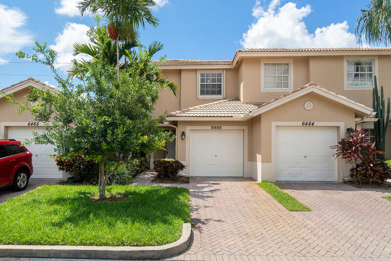 NEED HELP WITH CLOSING COSTS ? THEN YOU CAN OWN THIS PRISTINE HOME WITH A $5000 CREDIT AT CLOSING!   JUST MOVE RIGHT IN WITH NOTHING TO REPAIR!  ALL THE ROOFS WERE REPLACED IN 2023, THE A/C WAS REPLACED IN DECEMBER 2024, WATER HEATER  REPLACED IN LATE 2023,  HURRICANE ACCORDIAN SHUTTERS  UPSTAIRS & REGULAR PANELS (STORED IN THE GARAGE) ARE FOR THE DOWNSTAIRS. THERE IS EXTRA GUEST PARKING WHERE THIS UNIT IS LOCATED. DON'T DELAY, COME SEE IT TODAY!