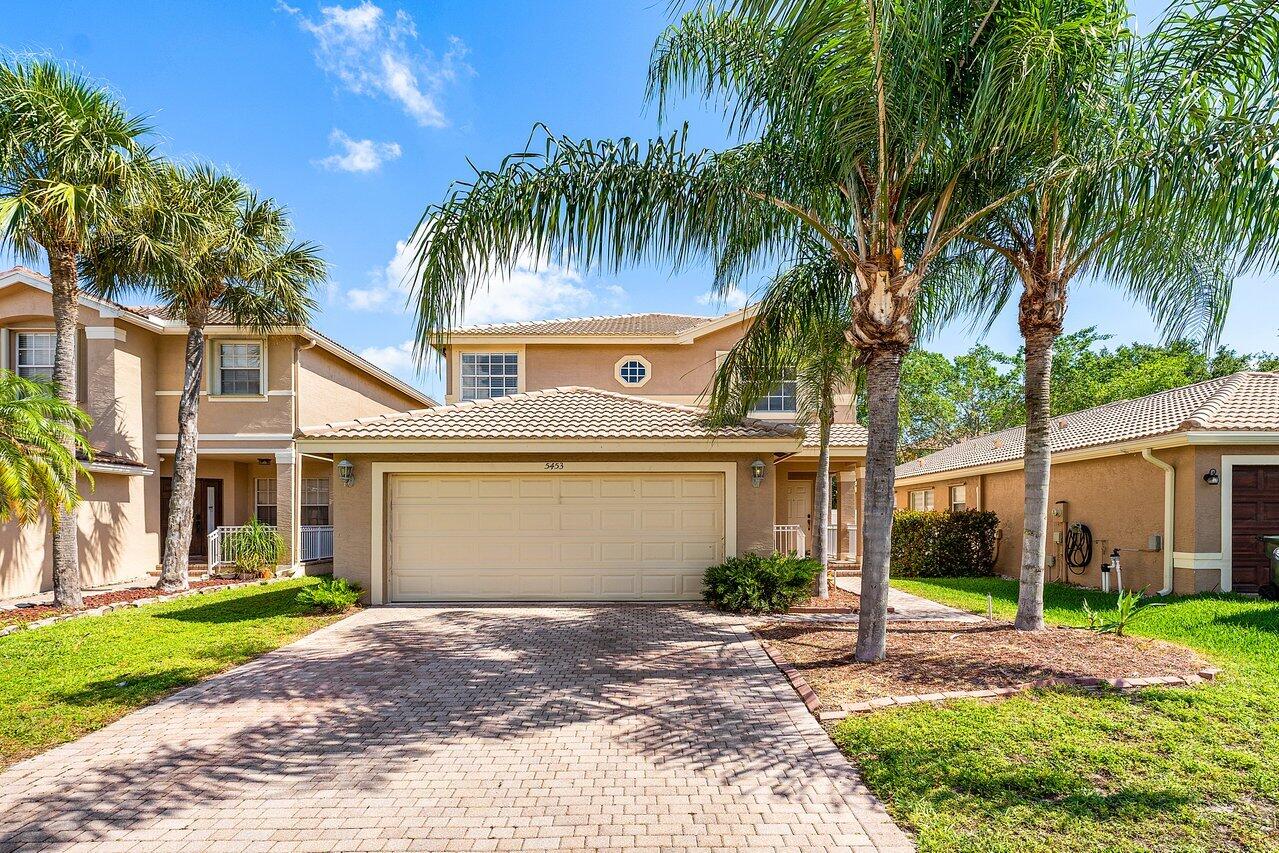 A great opportunity for those looking for a detached, single family home in a guard gated community, all at an entry level price! This home features a split floorplan on the first floor giving plenty of furnishing options. A fully fenced in backyard with large mango trees offers a truly "Florida" lifestyle. The home could do with some cosmetic TLC and is priced as such. Within the gate community you have one of the most amenity rich HOA's around. Soccer fields, playgrounds, tennis courts, an amazing pool area, newer exercise equipment and walking paths truly give great value for cost here. Also conveniently located across the street from the local elementary school. This home may just be the one you have been waiting for!