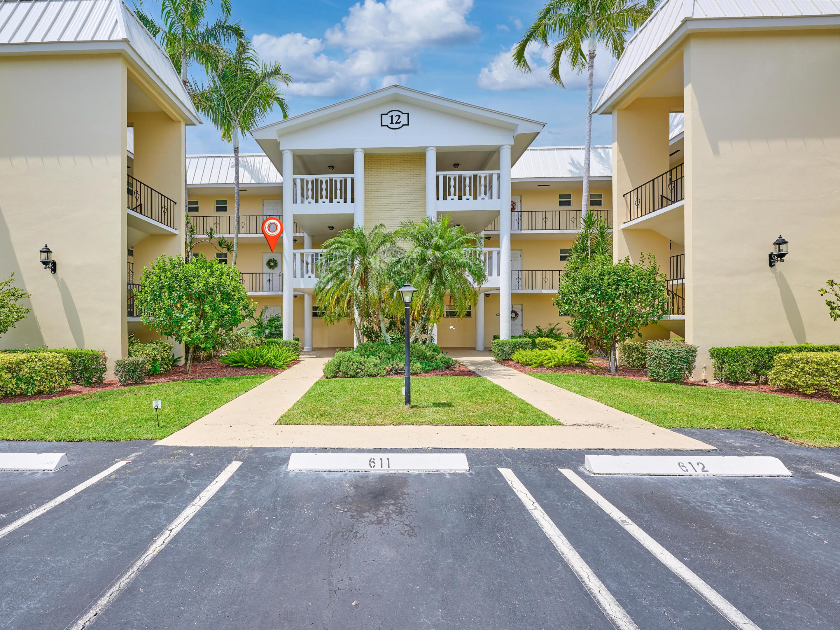 Experience the best of South Florida living in this beautifully updated second story residence at Colonial Club, a vibrant Intracoastal waterfront community in Boynton Beach. Convenient elevator access is steps away to this light filled open concept floor plan designed for comfortable living and entertaining.  Newly renovated kitchen showcases new white cabinetry, elegant quartz countertops, new stainless steel appliances, making it an excellent choice for those seeking a well-appointed coastal community within walking distance to the beach, perfect for either full time or seasonal living.  Additional upgrades include a 1 year old air conditioning system and full hurricane-impact windows. All information and sizes deemed reliable but not guaranteed. The building has also undergone significant improvements, including a new roof, fresh exterior paint, and a new front entry door.  The condo has common use of a large balcony steps from the front door which is perfect for cozy gatherings with friends and family; enjoying sunsets or watching the space shuttles. Residents of Colonial Club enjoy an array of resort-style amenities, including a newly renovated waterfront clubhouse, heated saltwater pool, fitness center, library, and picturesque walking paths along the Intracoastal Waterway.   Ideally located just minutes from pristine beaches, shopping, dining, and the vibrant destinations of Boynton Beach, Delray Beach, Boca Raton, and West Palm Beach. This exceptional home offers the perfect blend of comfort, convenience, and coastal charm.  The sun room converts to sleeping space with a queen size  Murphy bed for guests.