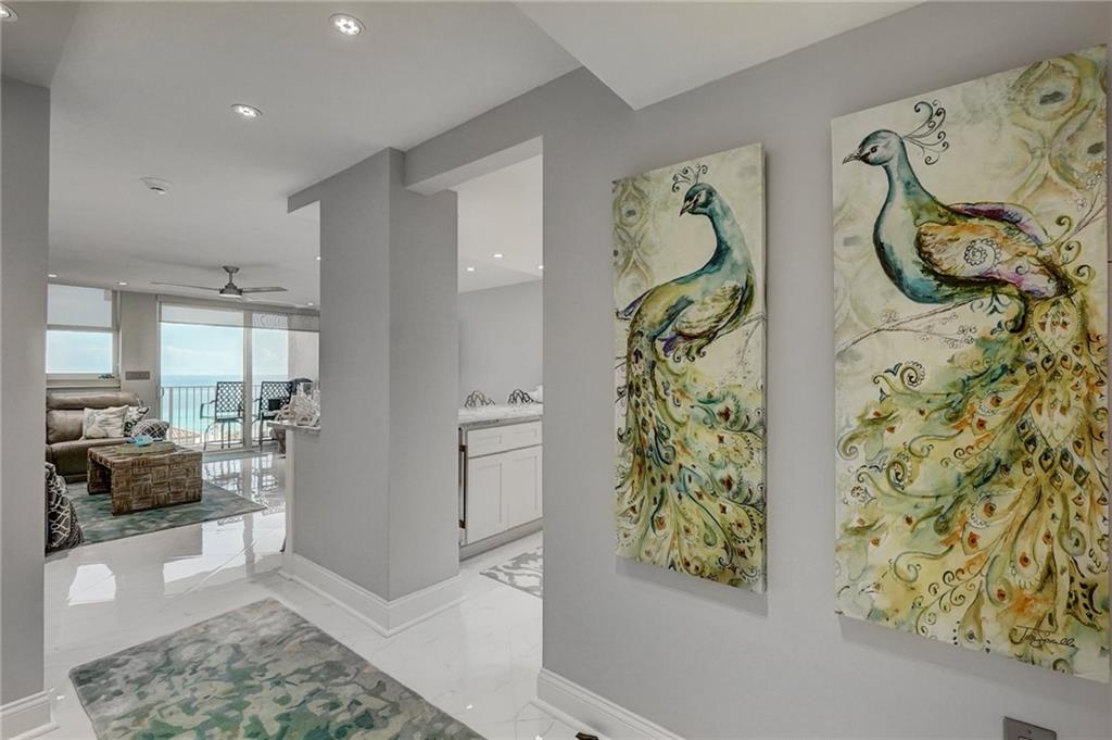 NOT ENOUGH ADJECTIVES TO DESCRIBE THIS AMAZING CONDO..TOTALLY RECONSTRUCTED WITH NO EXPENSE SPARED...TOO MANY UPGRADES TO LIST..AND THEN THERE IS THAT AMAZING DIRECT OCEAN VIEW!!!!WHO WILL BE THE LUCKY ONE TO GET THIS??????