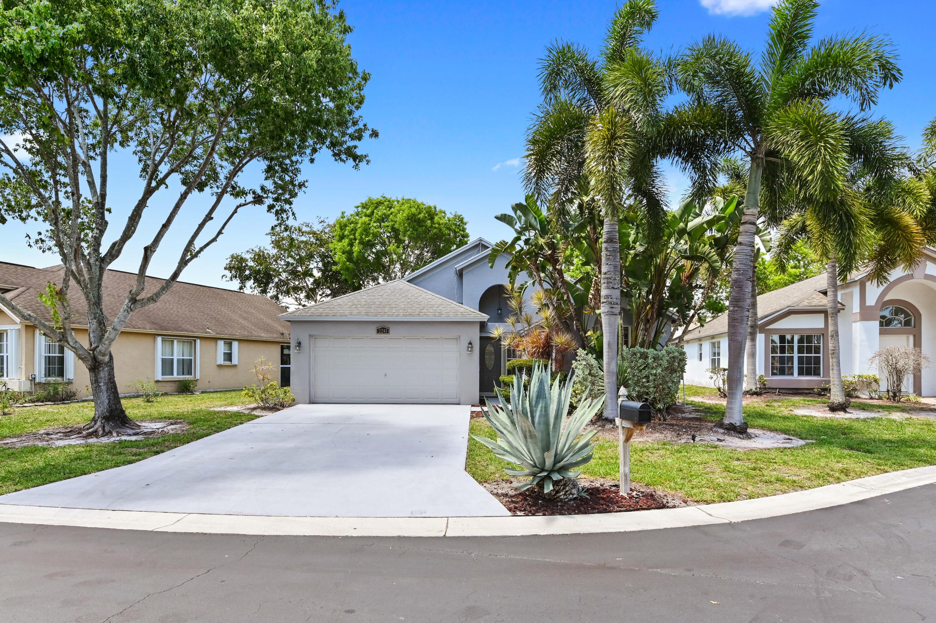 For Rent in the desirable River Bridge community! This gated, waterfront single-story home offers 1,460 sq ft of comfortable living space with 3 bedrooms and 2 bathrooms. Step inside through the entrance foyer to a bright layout featuring a combined dining and living area, a well-appointed kitchen with appliances, and a cozy breakfast area. Tile flooring flows throughout the home, complemented by elegant plantation shutters.  Enjoy added peace of mind with full accordion shutters, including protection for the main door, windows, and sliding glass doors leading to the screened/closed patio. The home also features a dedicated laundry room with a washer and dryer for added convenience.   Outside, take in tranquil lagoon water views from your screened patio, perfect for relaxing or entertaining. A 2-car attached garage plus driveway provides ample parking space. Located in a gated community with a serene waterfront setting, this rental offers both comfort and security.