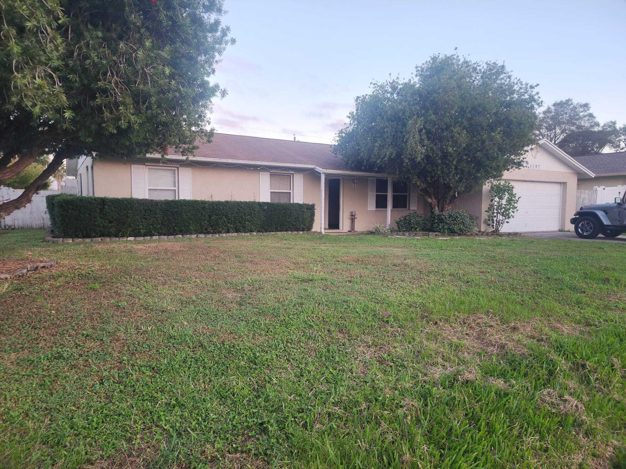 Here is your nice home to enjoy with your loves one. You just got what you have been looking for !!! This beautiful 3/2/2 CBS home comes with additional square footage in the form of a sizable Florida room. This home offers a new titled living room, family room, eat-in kitchen, and laundry room nook. New appliances!!! Property is freshly painted interior and exterior. This property has an enormous backyard where you and family can enjoy the nice weather outside. This family friendly home is walking distance to Jaycee Park, and minutes away from St. Lucie West's finest eateries, shopping and nightlife. Do not wait too longer.!!!! I